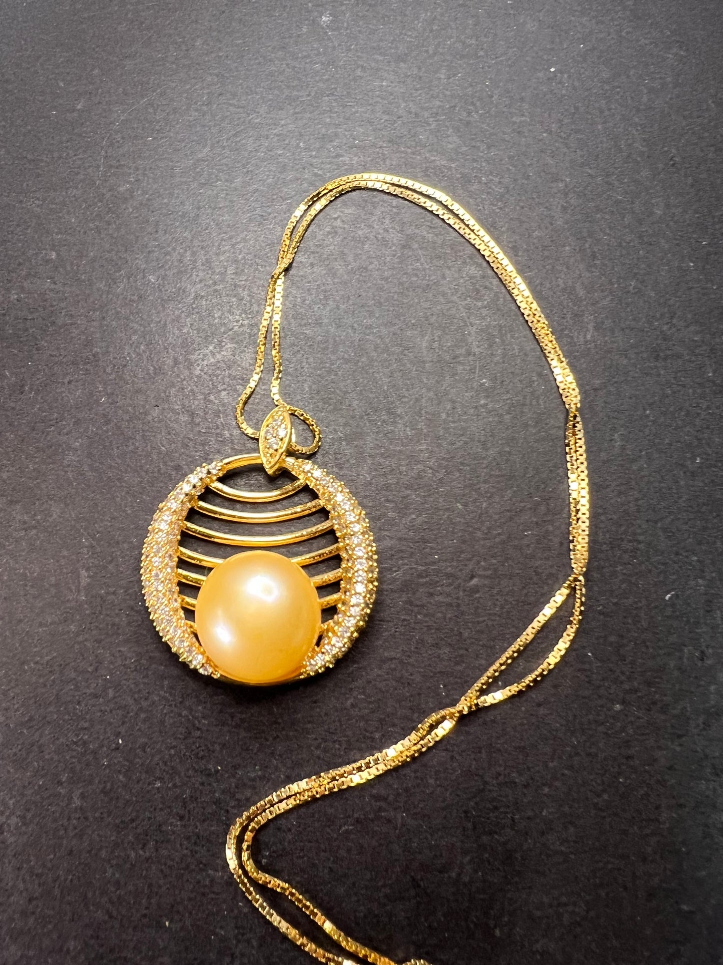 Golden yellow cultured pearl pendant in gold over sterling silver with chain