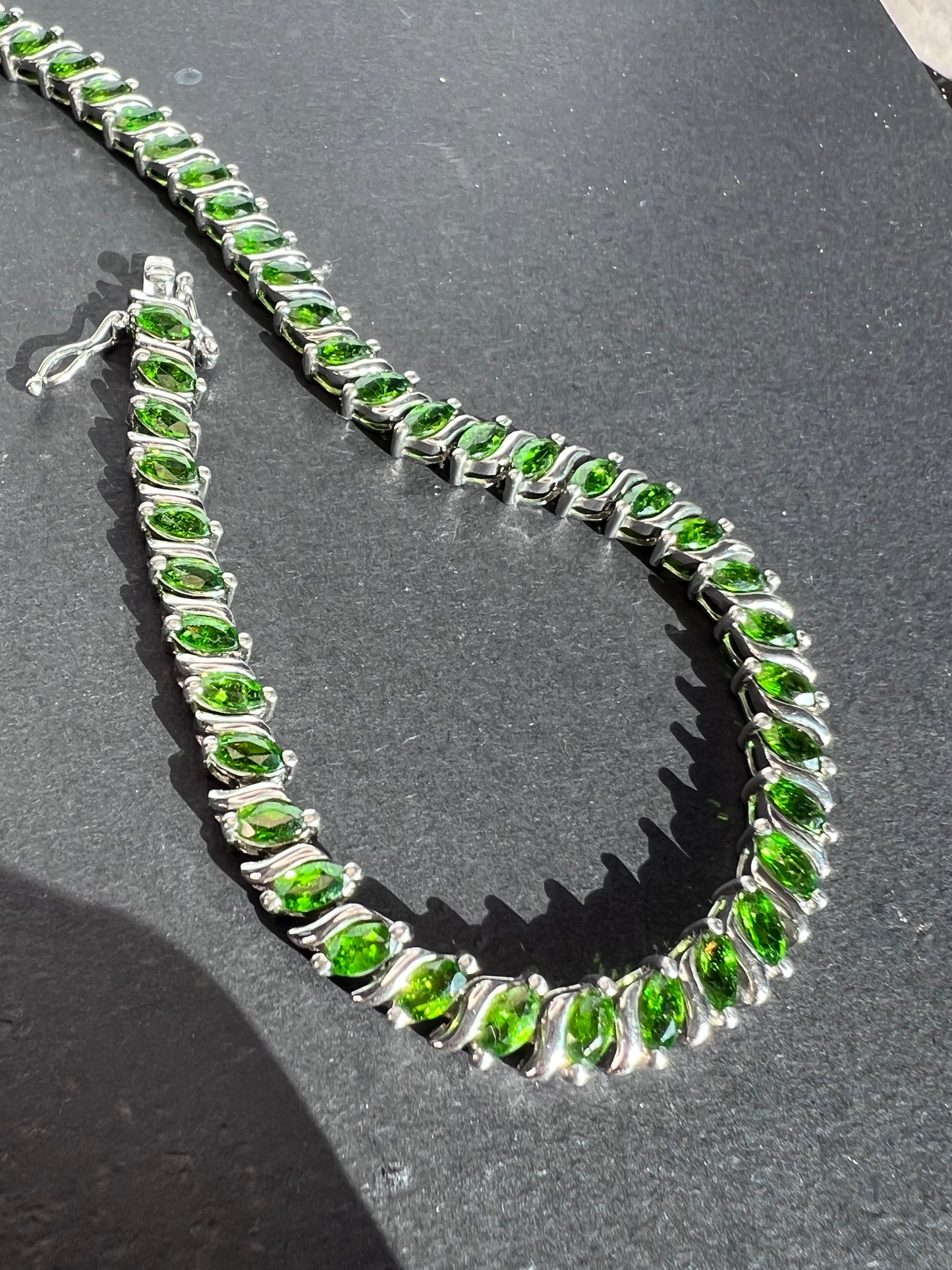 Chrome diopside tennis bracelet in rhodium over sterling silver