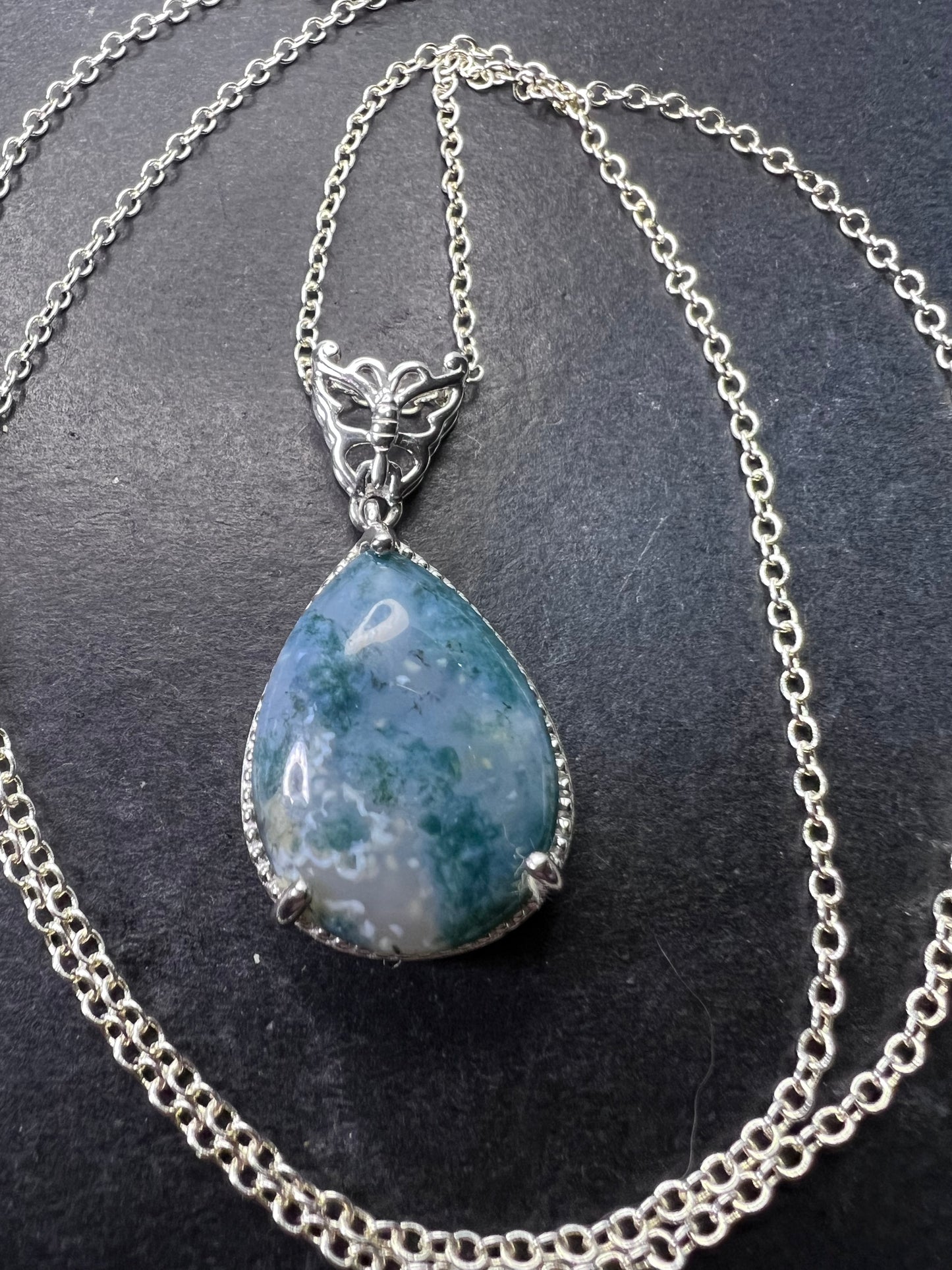 Moss agate teardrop pendant with butterfly in platinum over copper with 18 inch chain