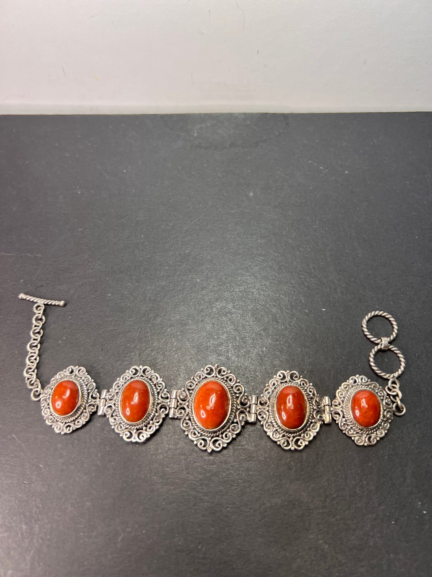 Red orange jade ornate sterling silver toggle bracelet