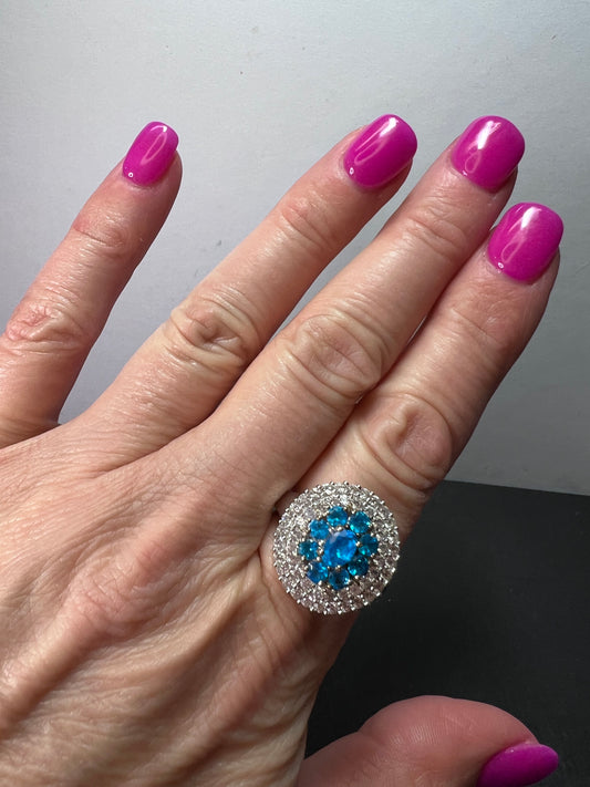 Neon blue apatite and white spinel halo cocktail ring in sterling silver size 9