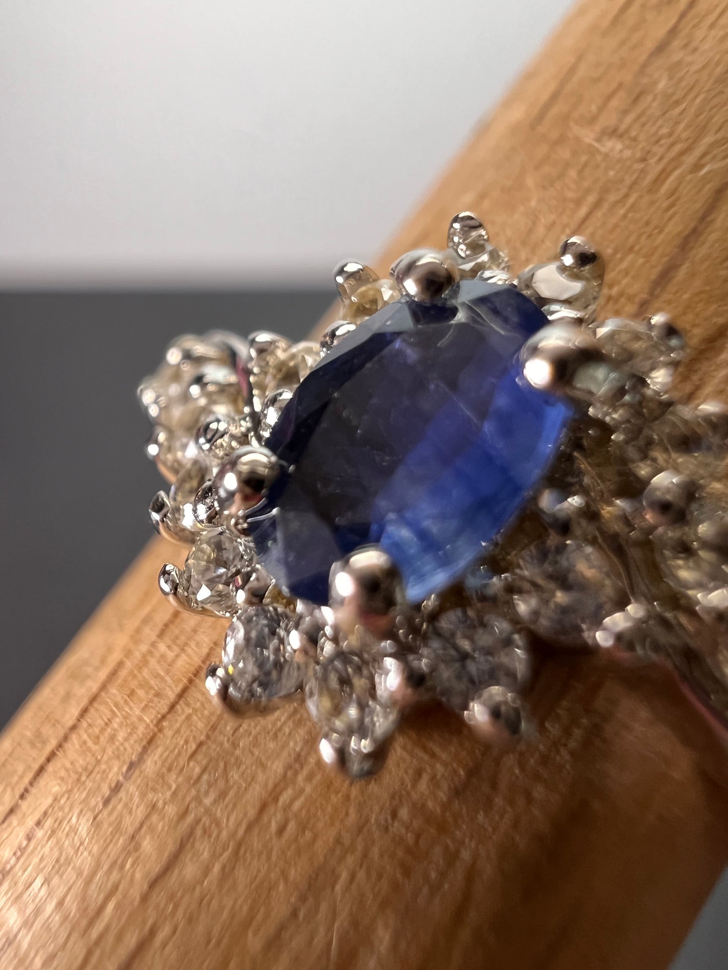 Blue sapphire and zircon floral ring in platinum over sterling silver size 5