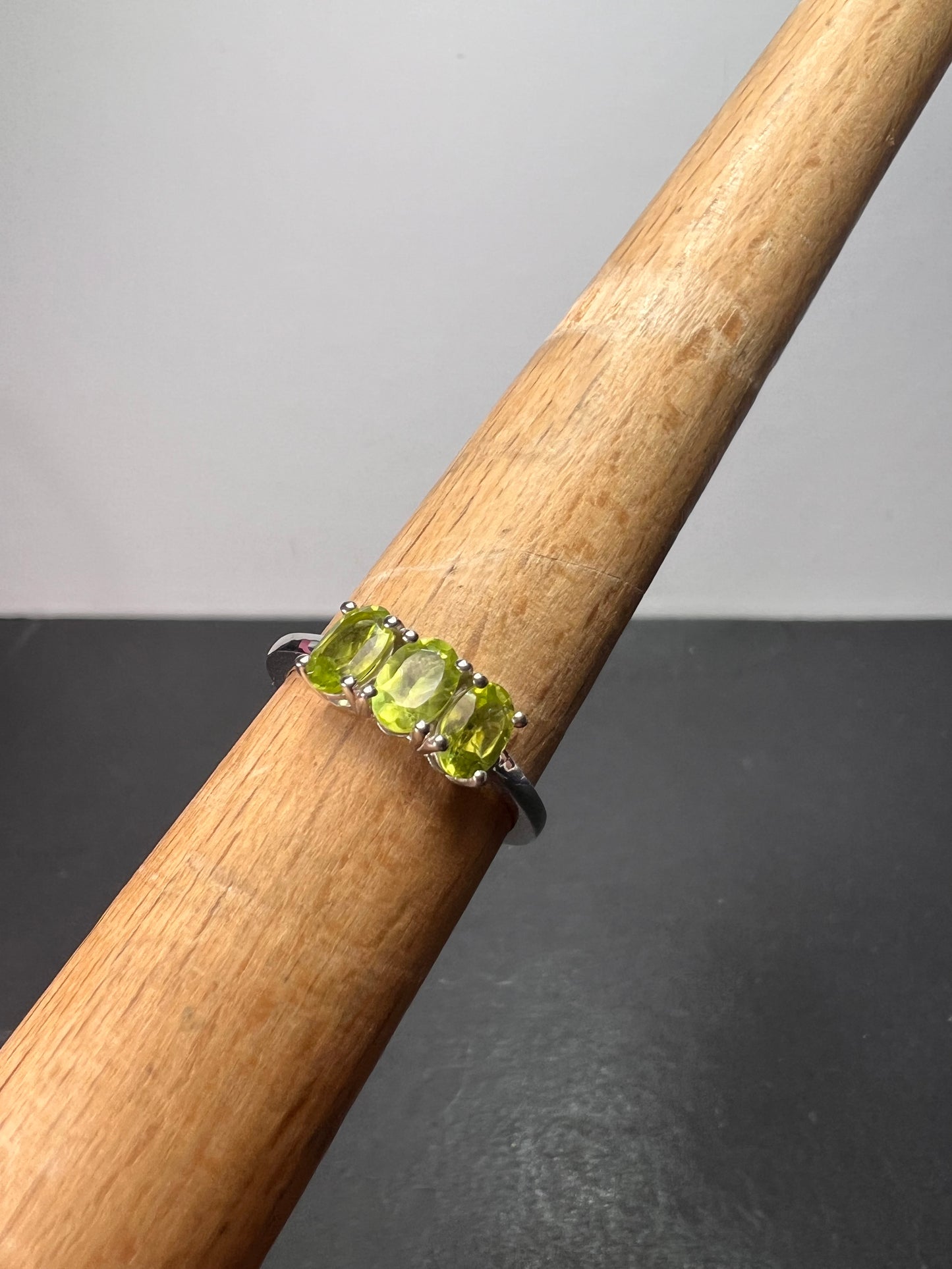 Peridot trilogy ring in platinum over Sterling silver size 7 *NEW*