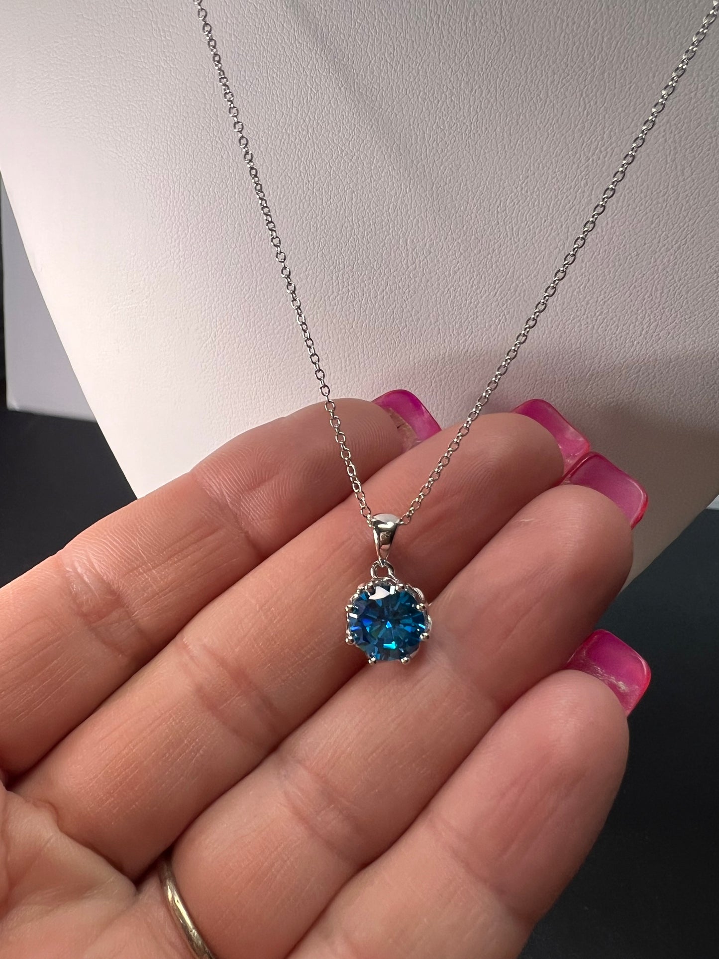 YGI blue CZ rhodium over sterling silver solitaire pendant and chain