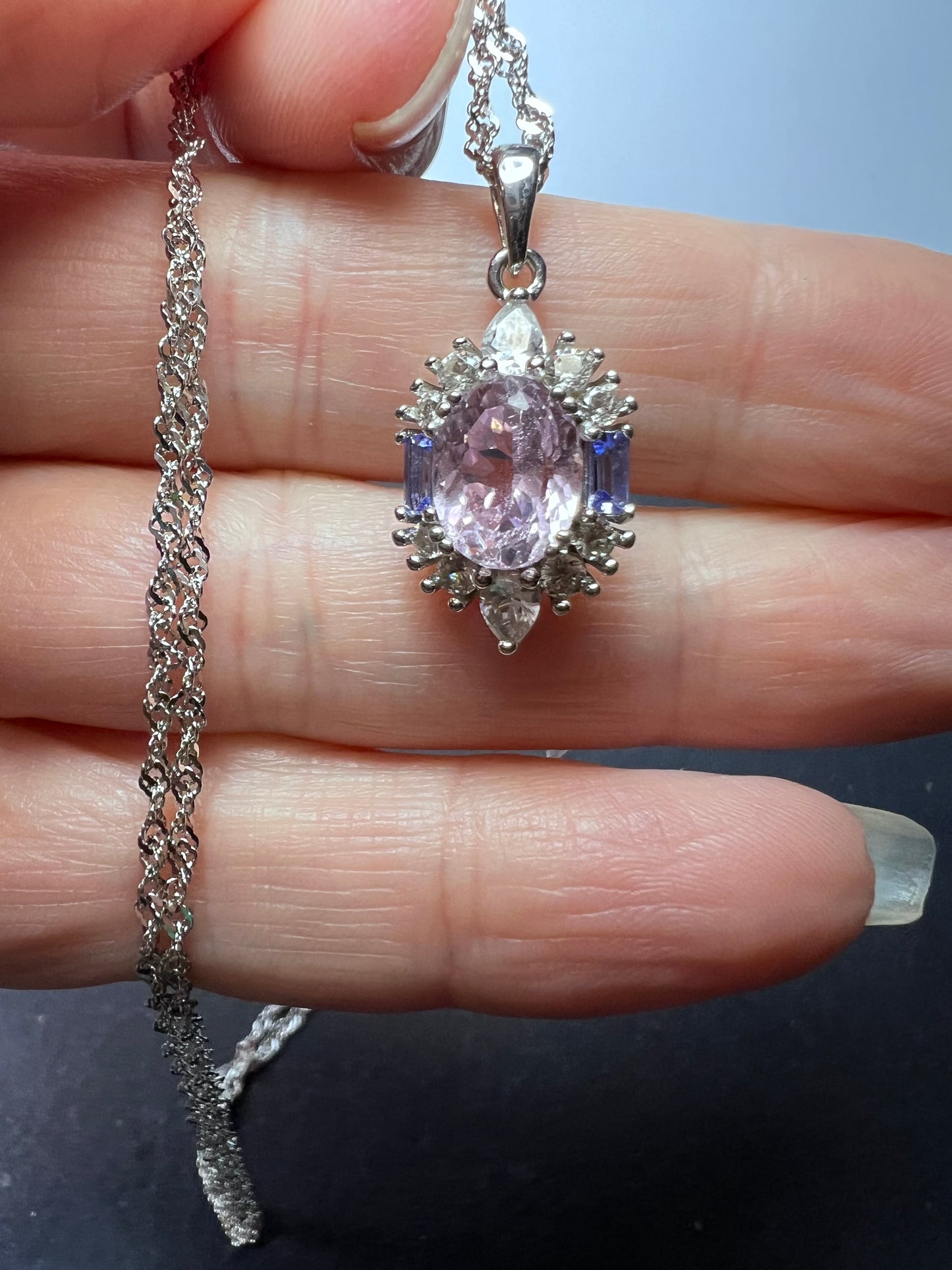 2.11ct Kunzite, 0.18ctw Tanzanite And 0.87ctw White Zircon Rhodium Over Silver halo Pendant With Chain