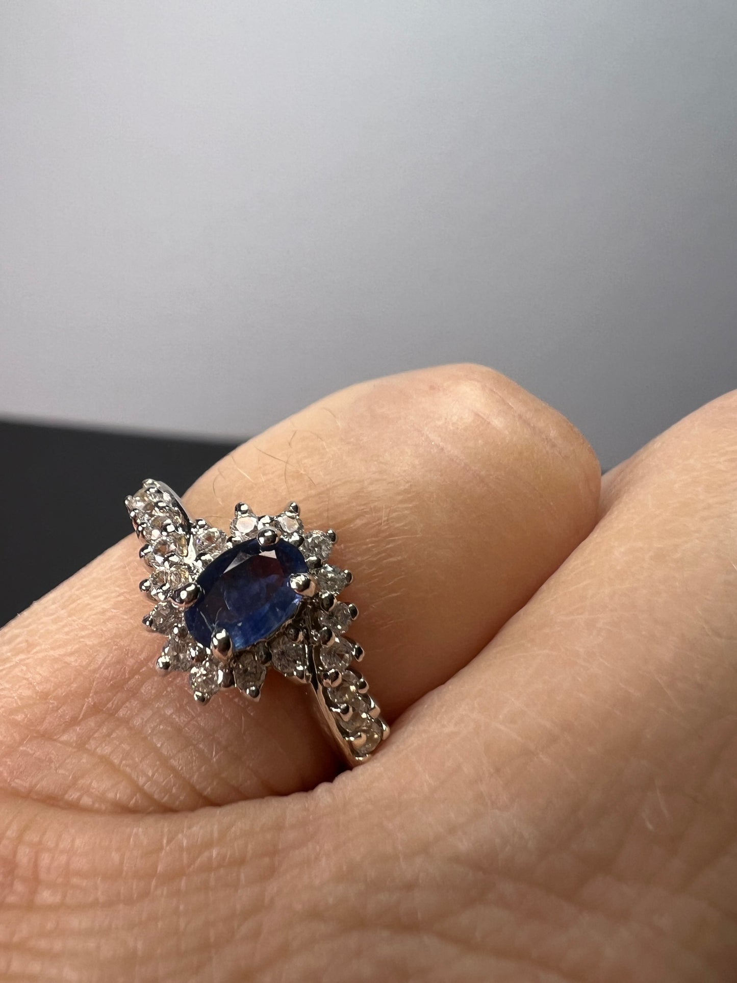 Blue sapphire and zircon floral ring in platinum over sterling silver size 5