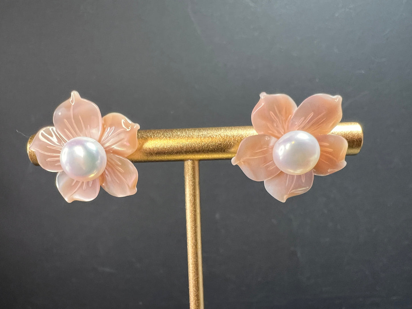 Vintage dead stock set of mother of pearl plumeria stud earrings in sterling silver