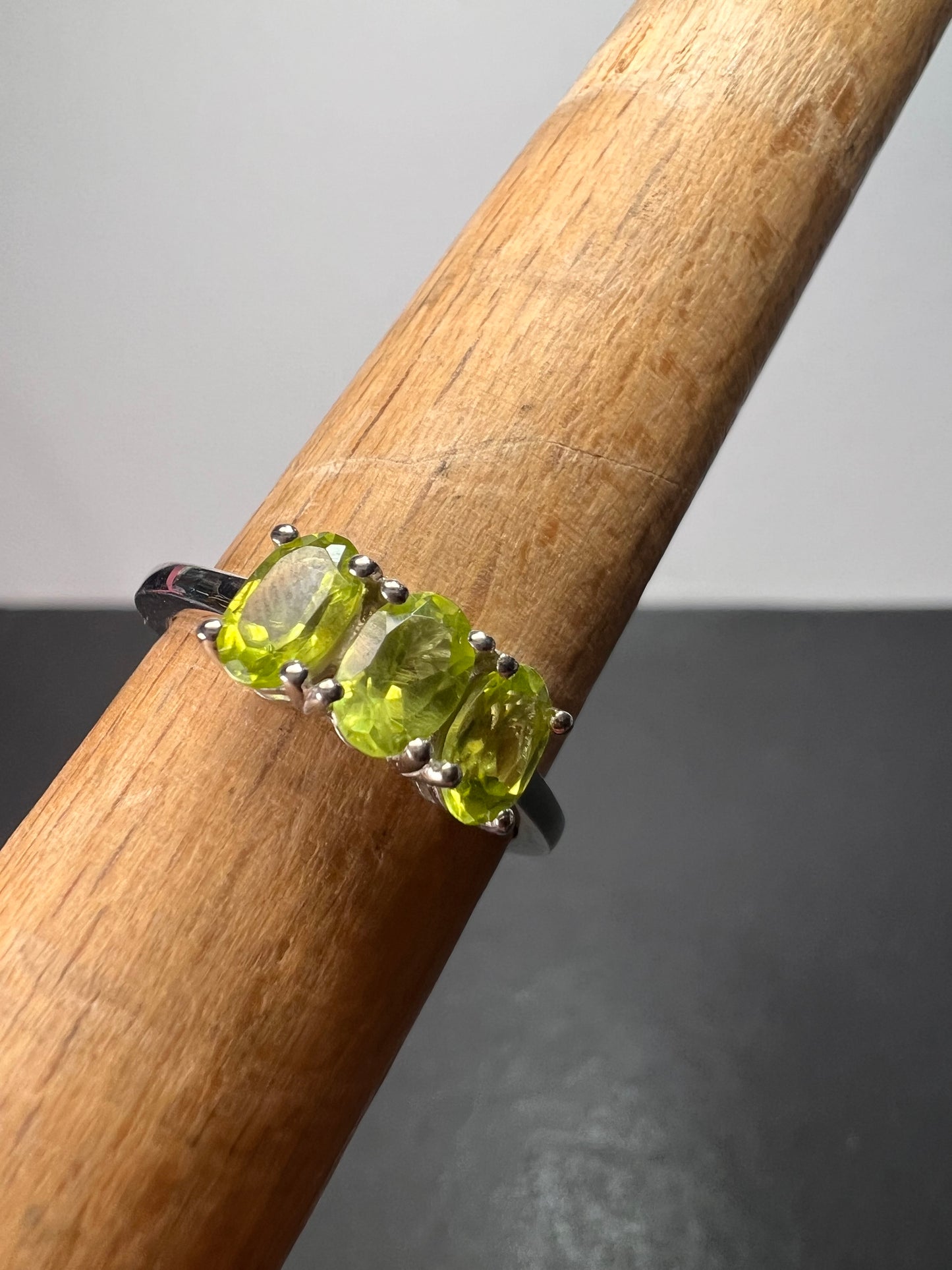 Peridot trilogy ring in platinum over Sterling silver size 7 *NEW*