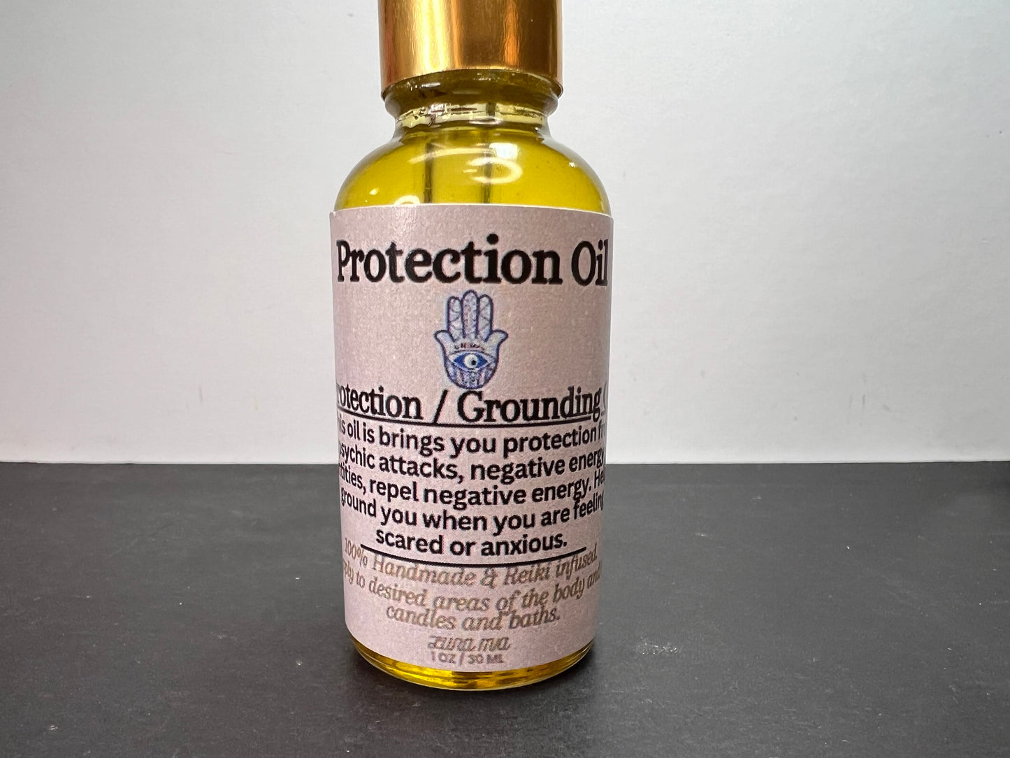 Protection and grounding oil by Luna Mia