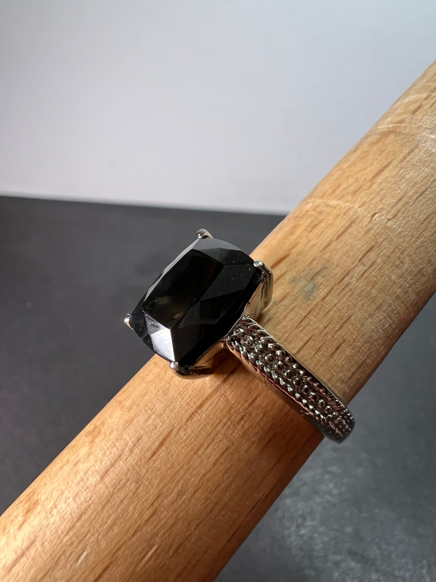 Black spinel in stainless steel ring size 9