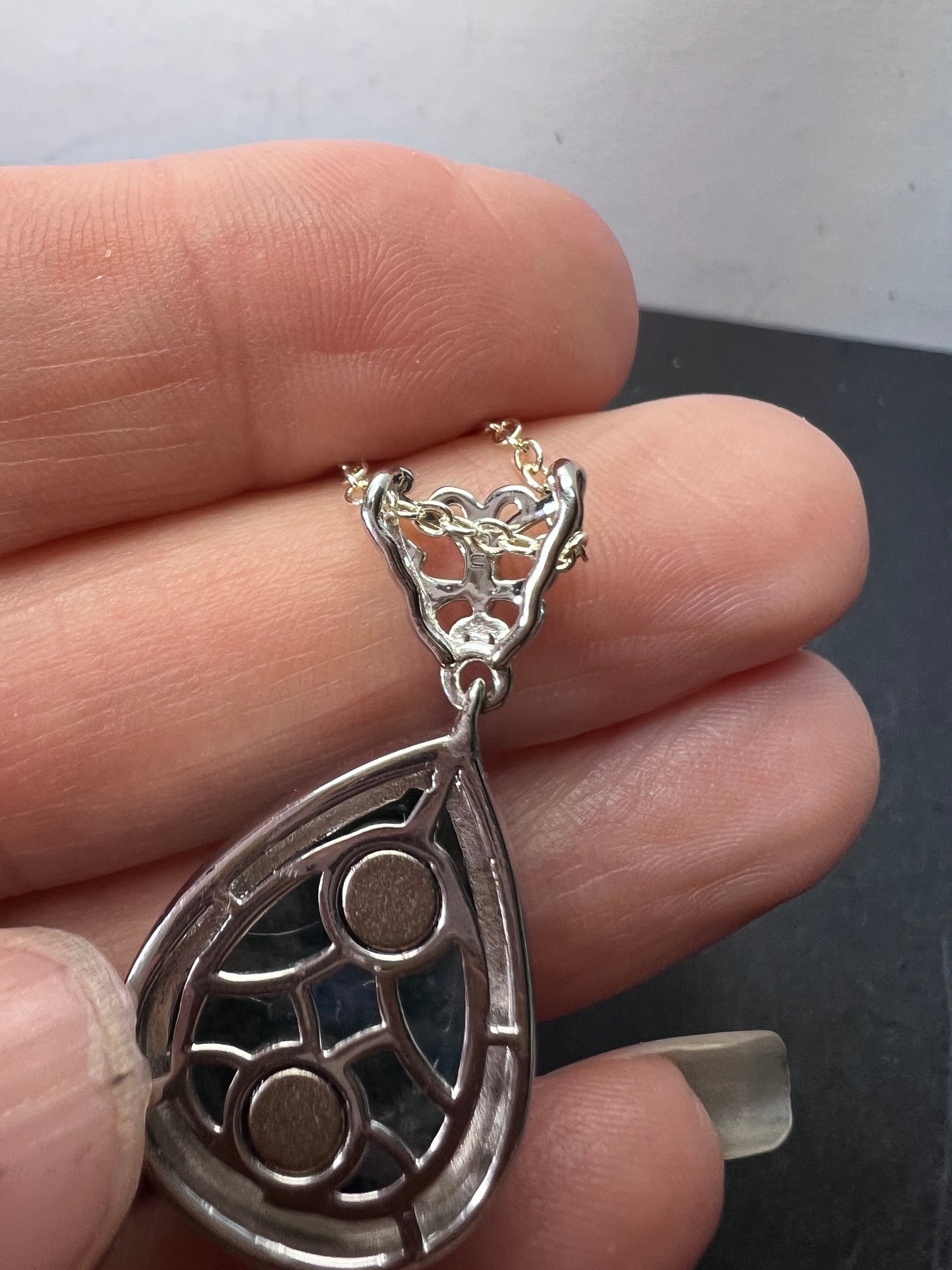 Moss agate teardrop pendant with butterfly in platinum over copper with 18 inch chain