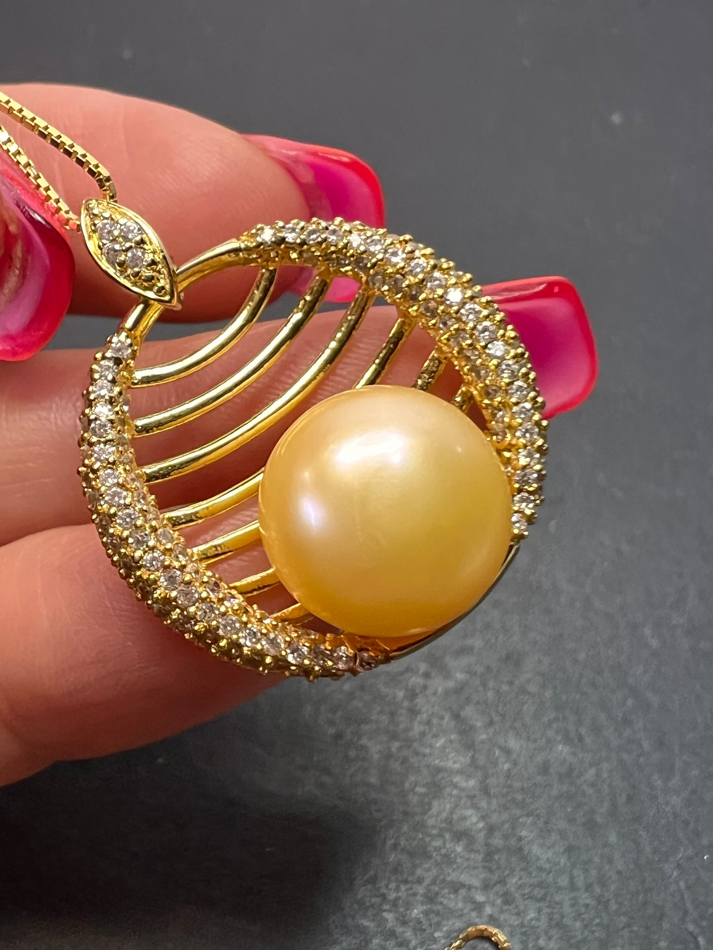 Golden yellow cultured pearl pendant in gold over sterling silver with chain