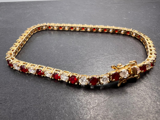 Red white CZ tennis bracelet in gold over 925 sterling silver