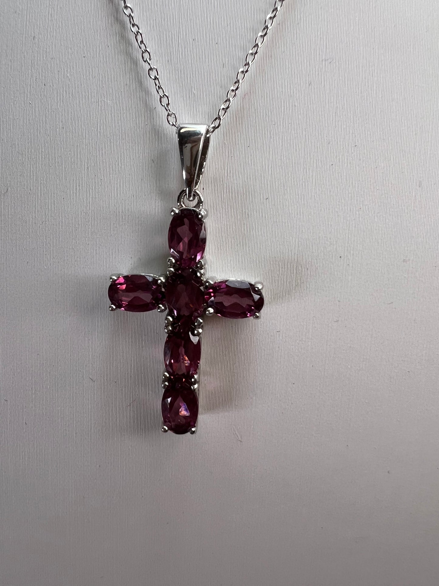 Raspberry rhodolite garnet cross pendant and chain necklace in sterling silver