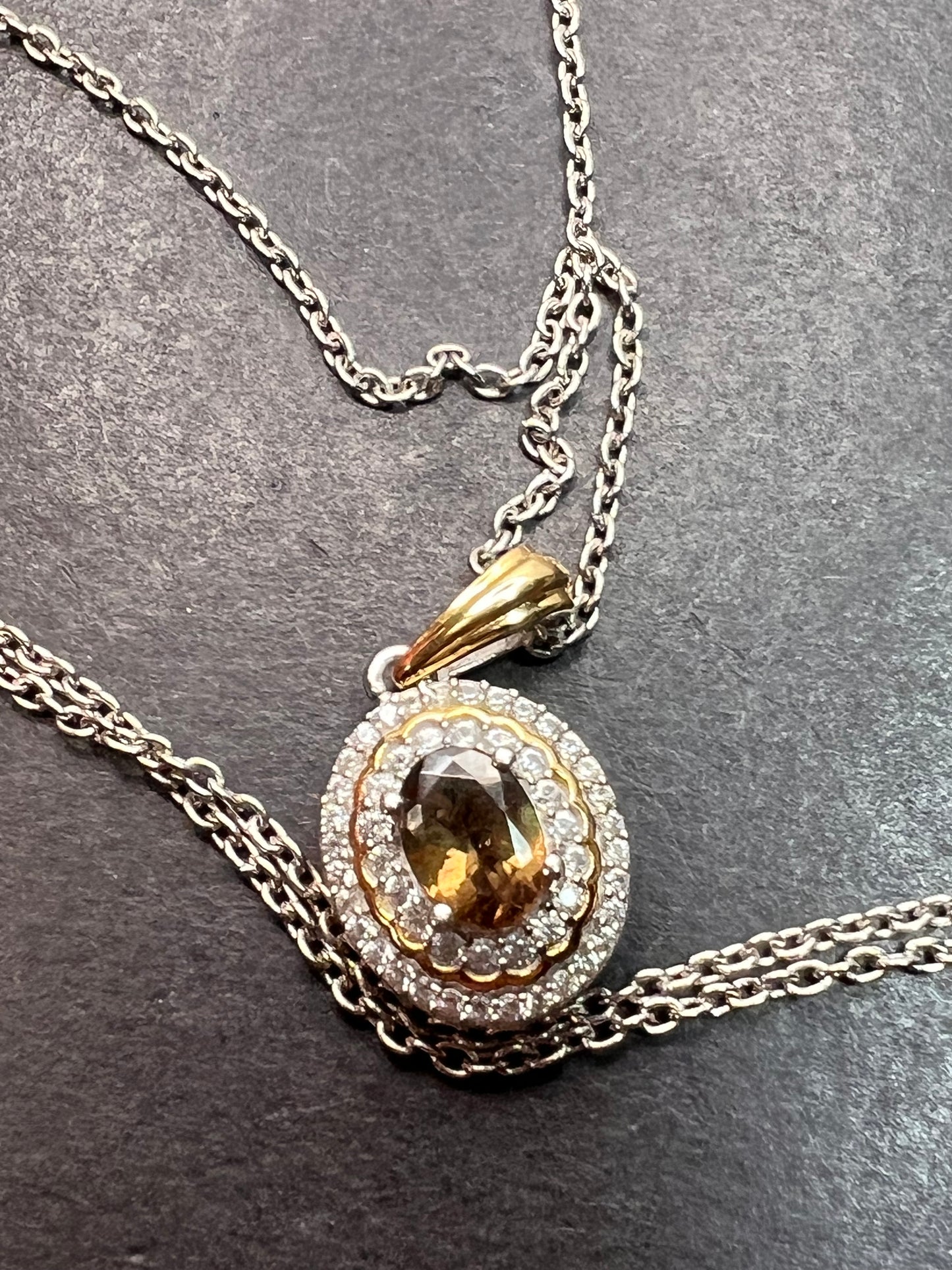 Golden tanzanite and zircon double halo two toned sterling silver pendant and chain necklace