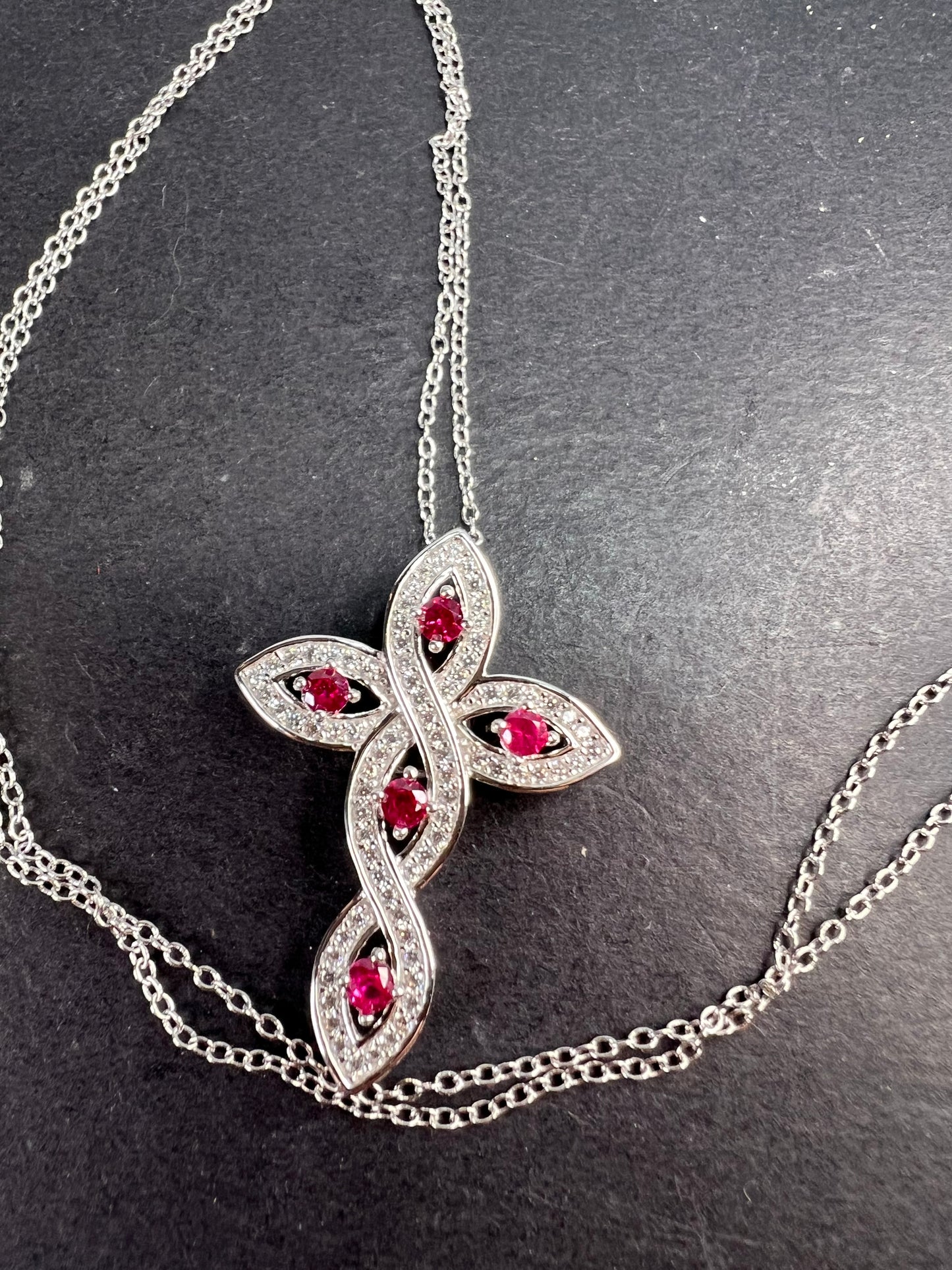 Lab grown ruby and CZ cross pendant and chain necklace in rhodium over sterling silver 18 inch