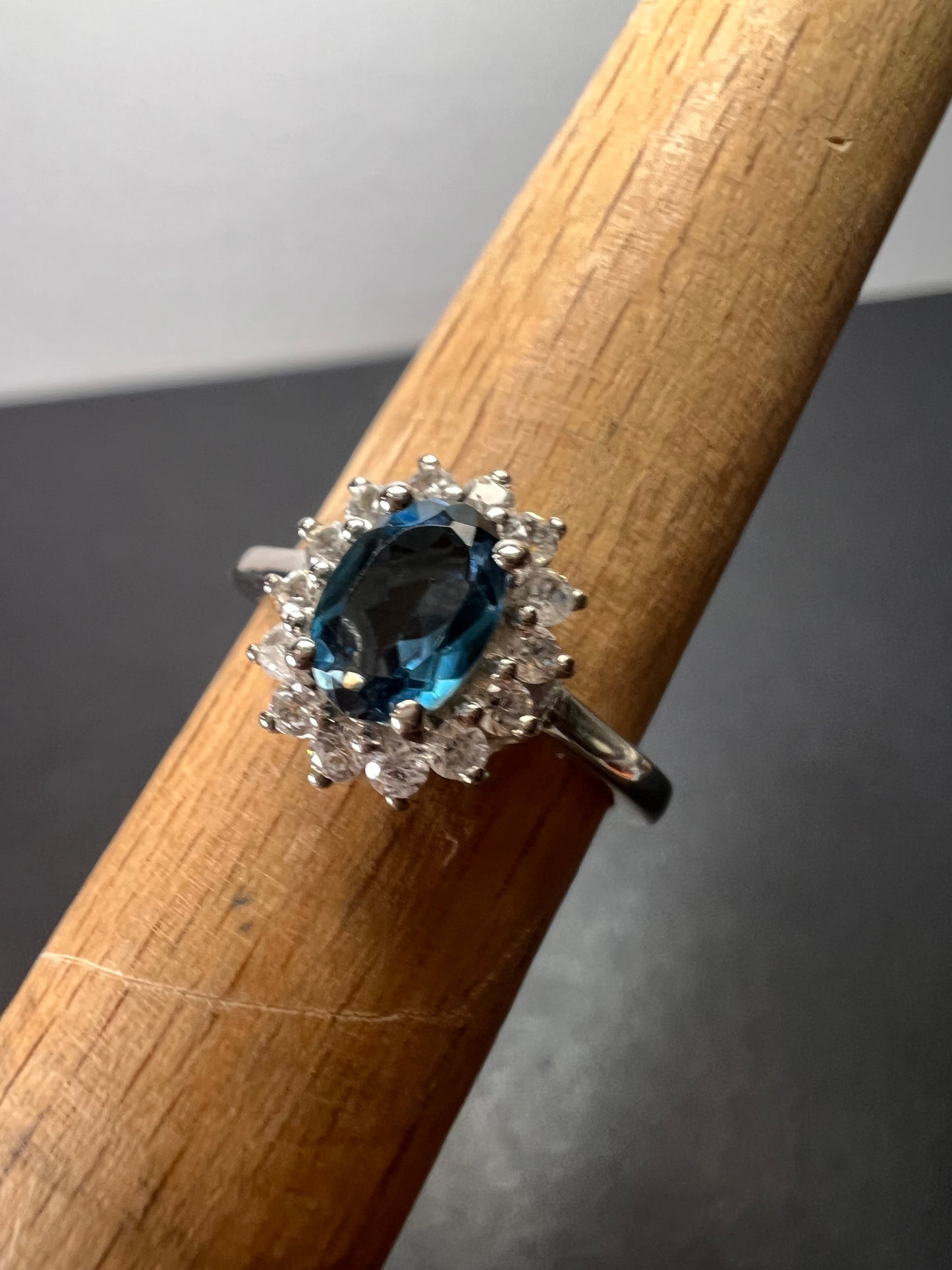 London blue topaz sunburst halo ring in platinum over sterling silver. ctw 1.40 size 5