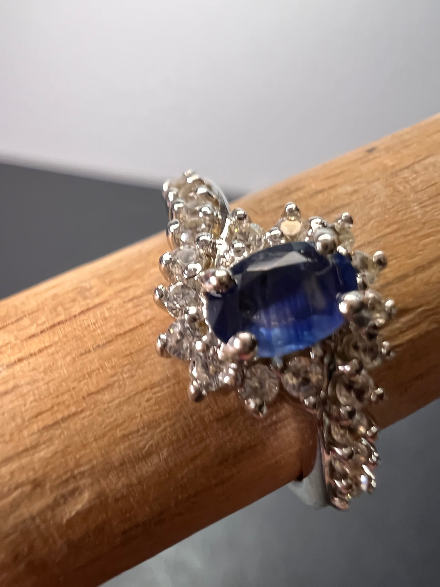 Blue sapphire and zircon floral ring in platinum over sterling silver size 5