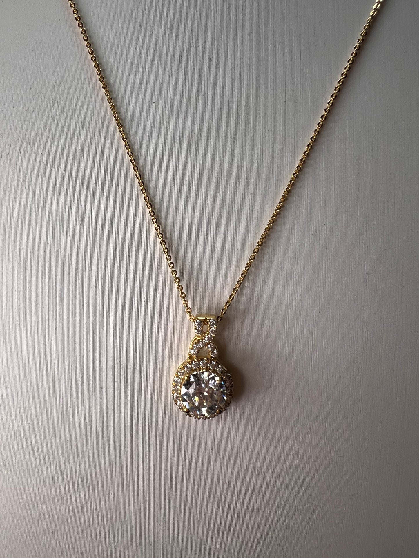 100 facet moissanite pendant necklace in gold over sterling silver