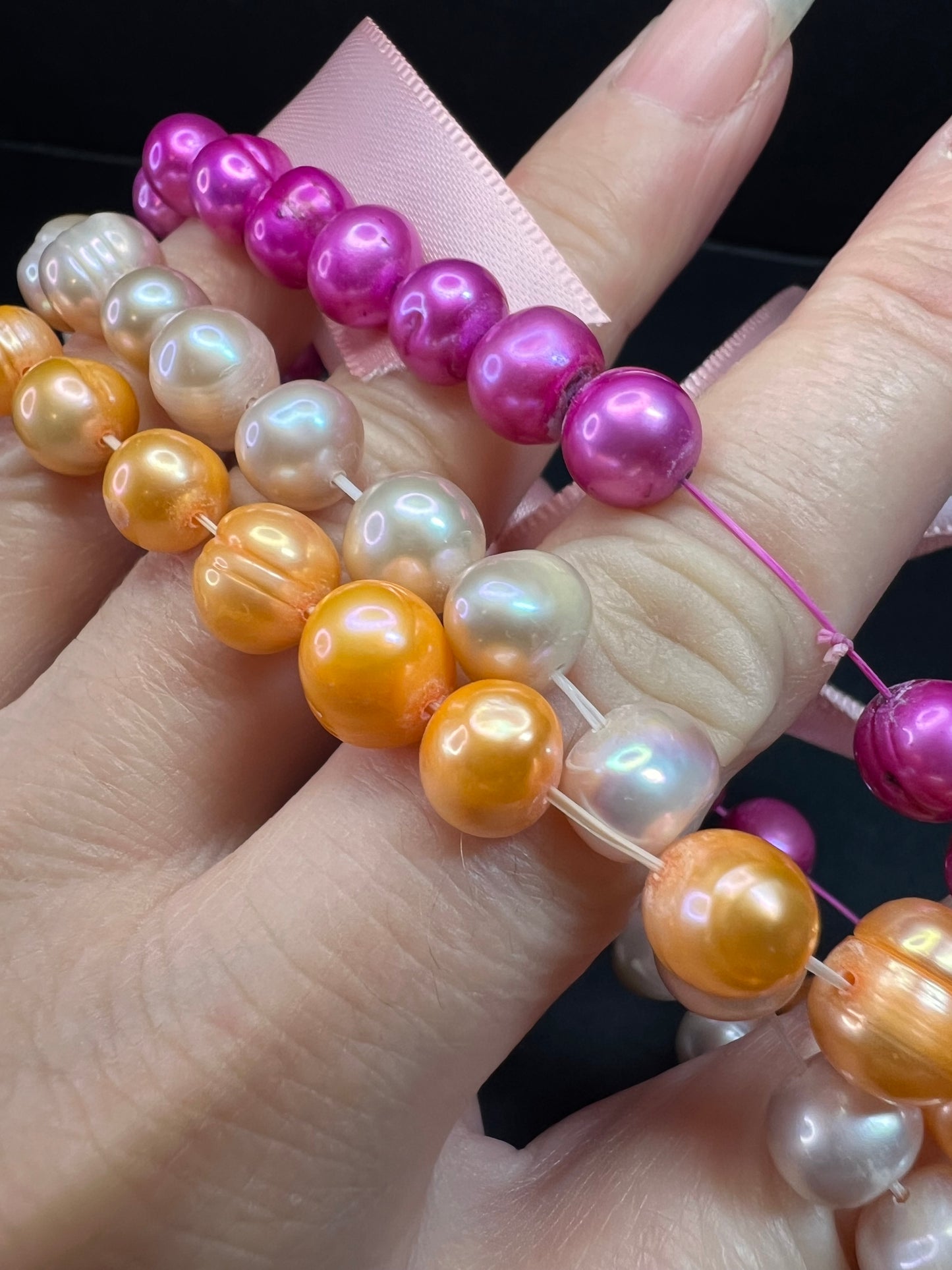 Set of three freshwater pearl stretch bracelets fuchsia pink to tangerine