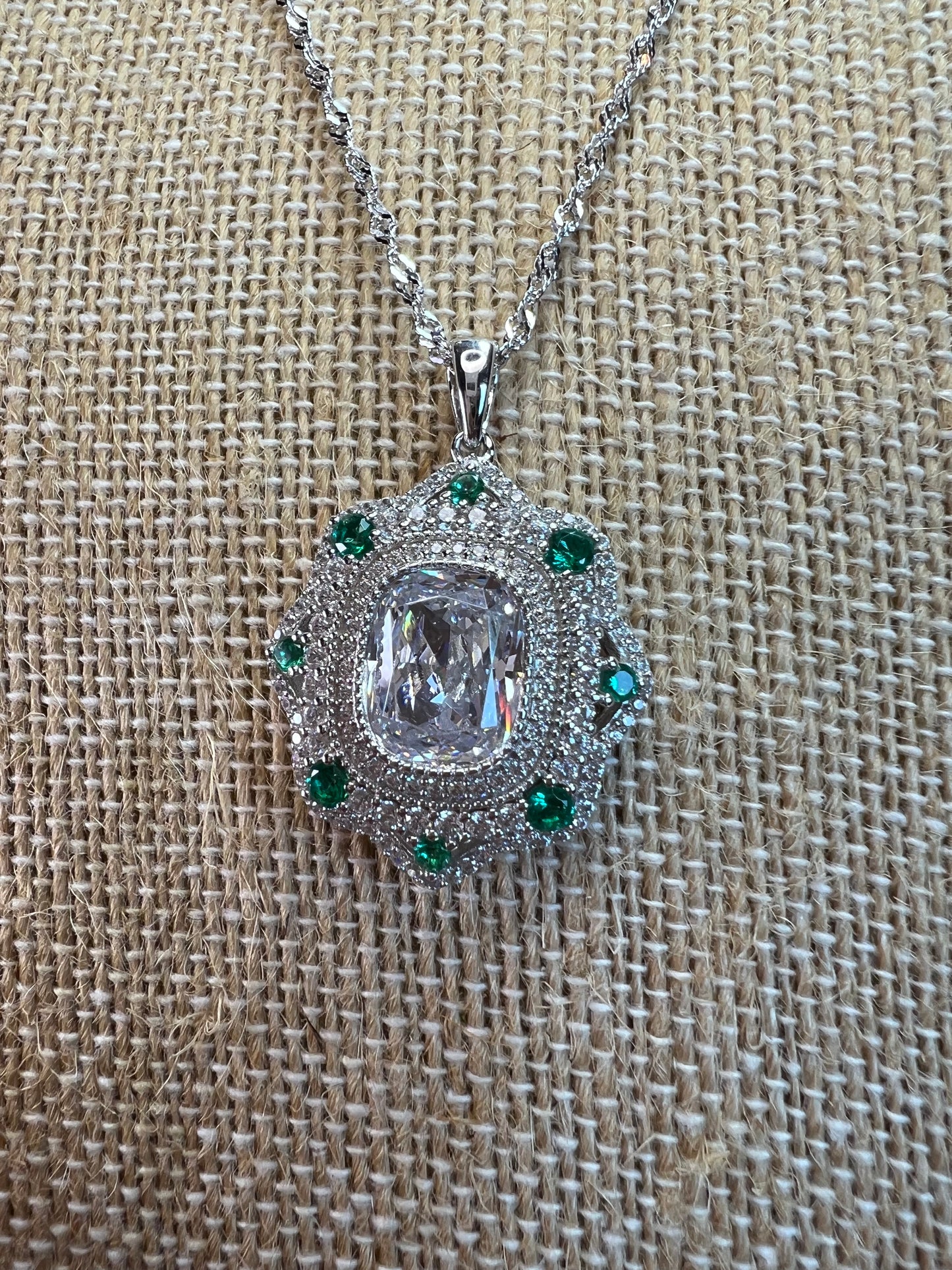 Bella Luce lab created green spinel and diamond simulant rhodium over sterling silver pendant with 18 inch chain necklace