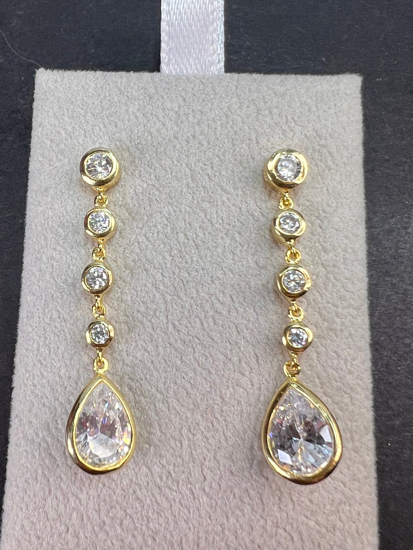 Long teardrop CZ earrings in gold over sterling silver