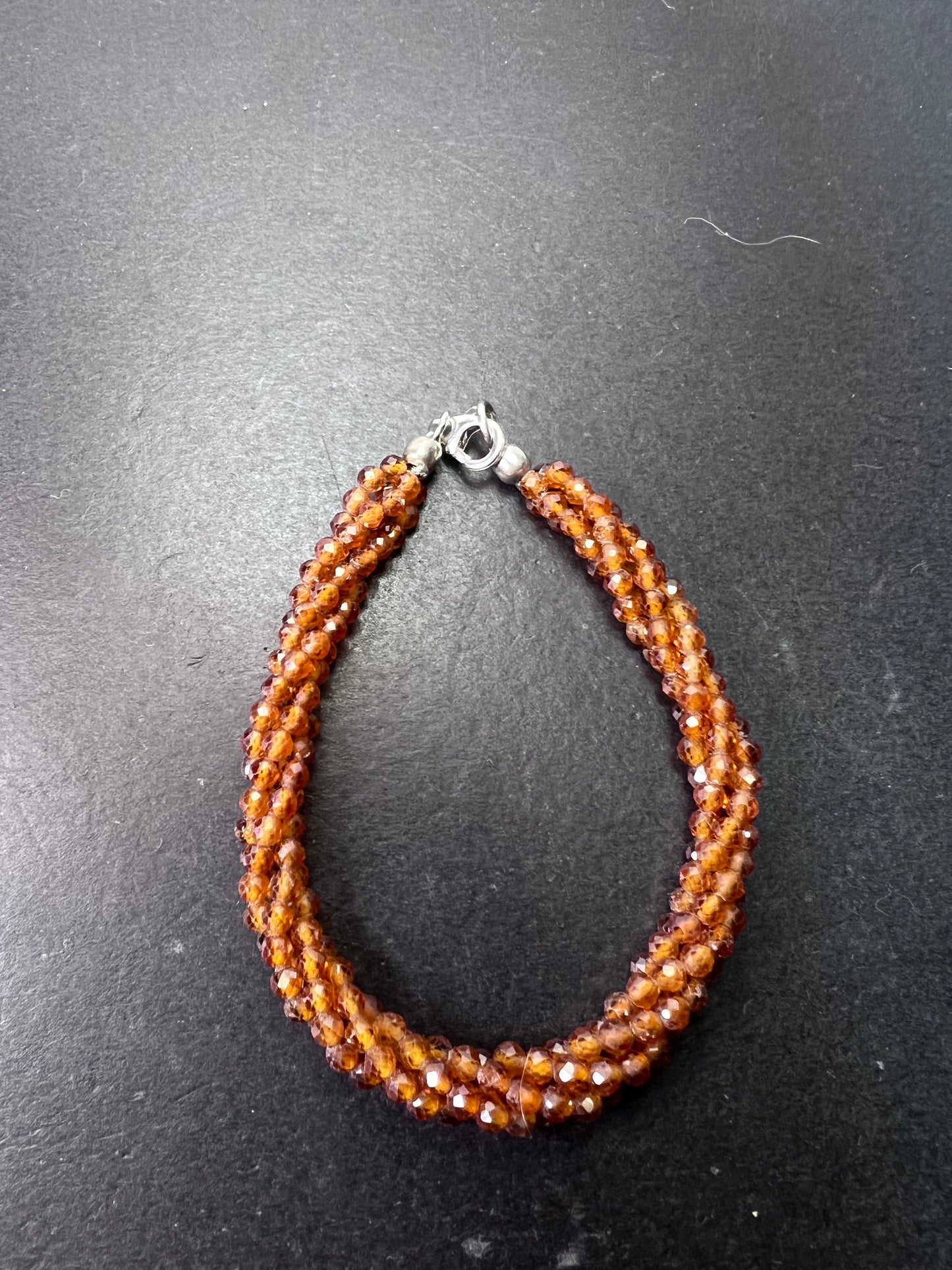 Hessonite garnet 4 strand bracelet with sterling clasp 7 inches