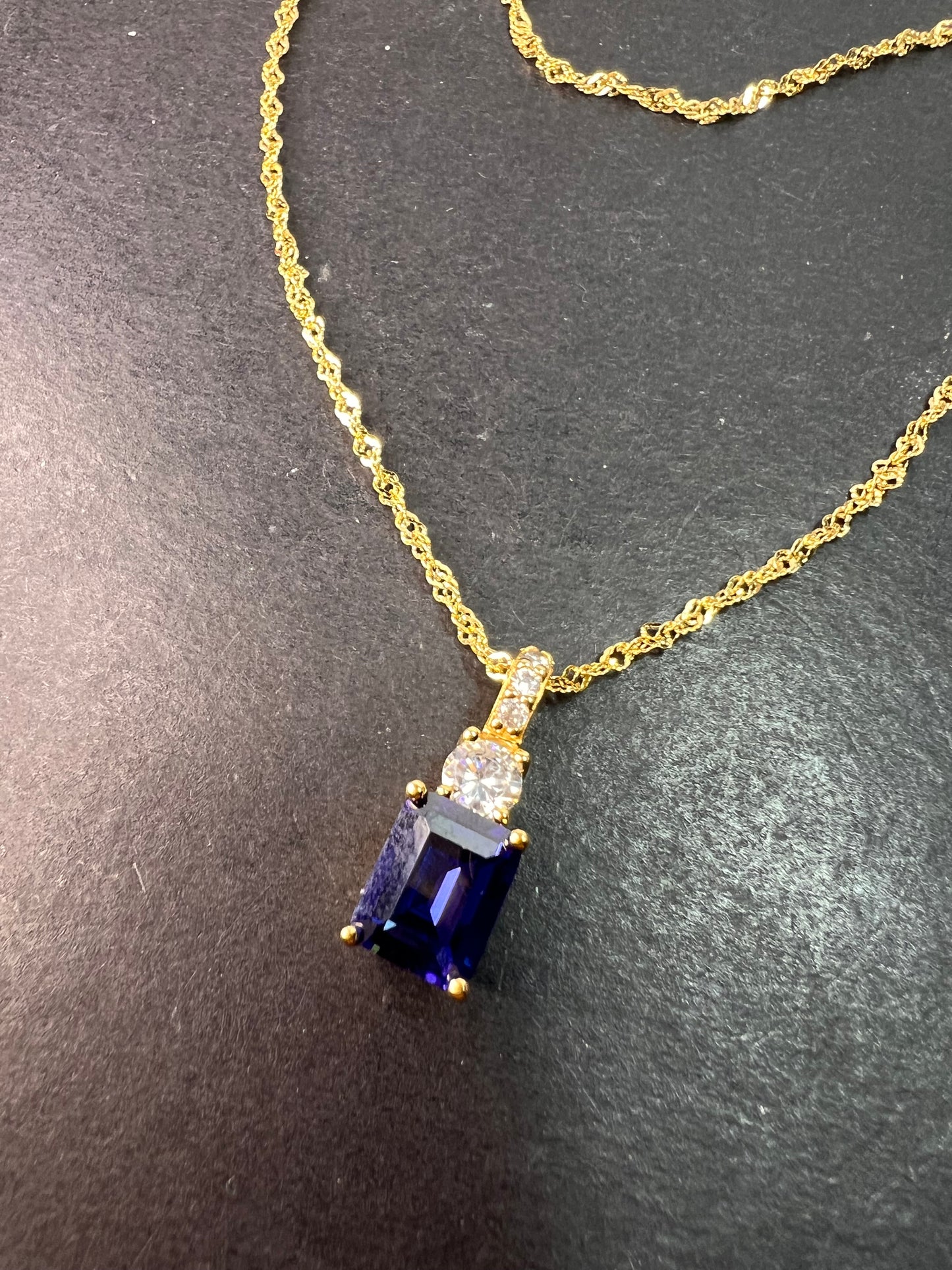 Blue emerald cut CZ pendant and chain necklace in gold over sterling silver 18 inches