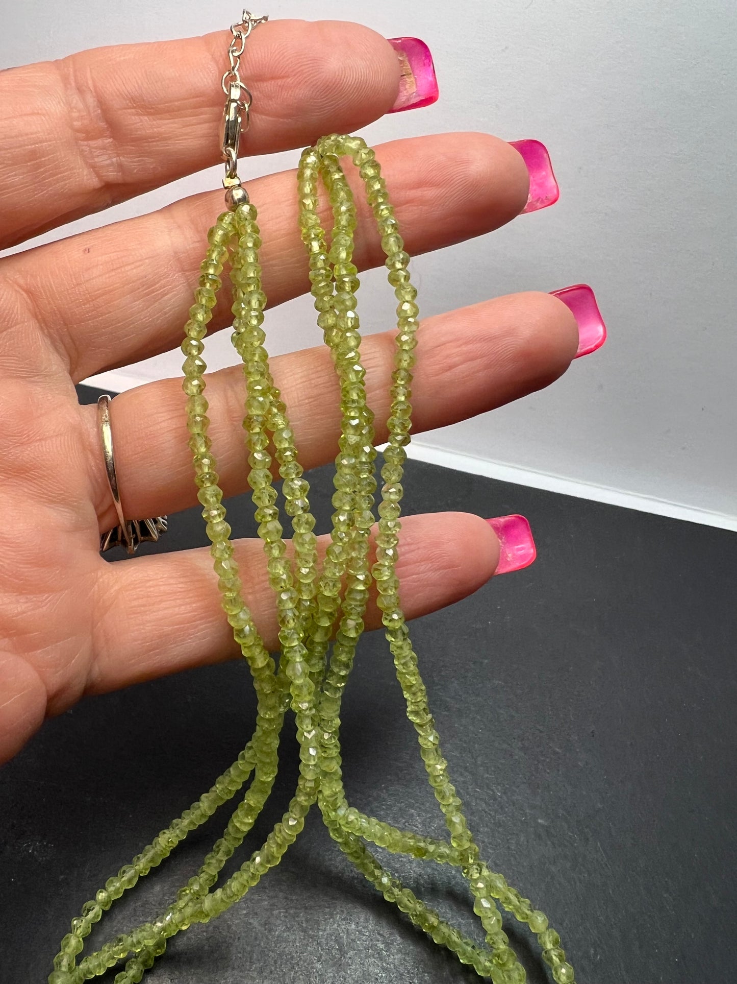 Layered peridot necklace with sterling silver clasp