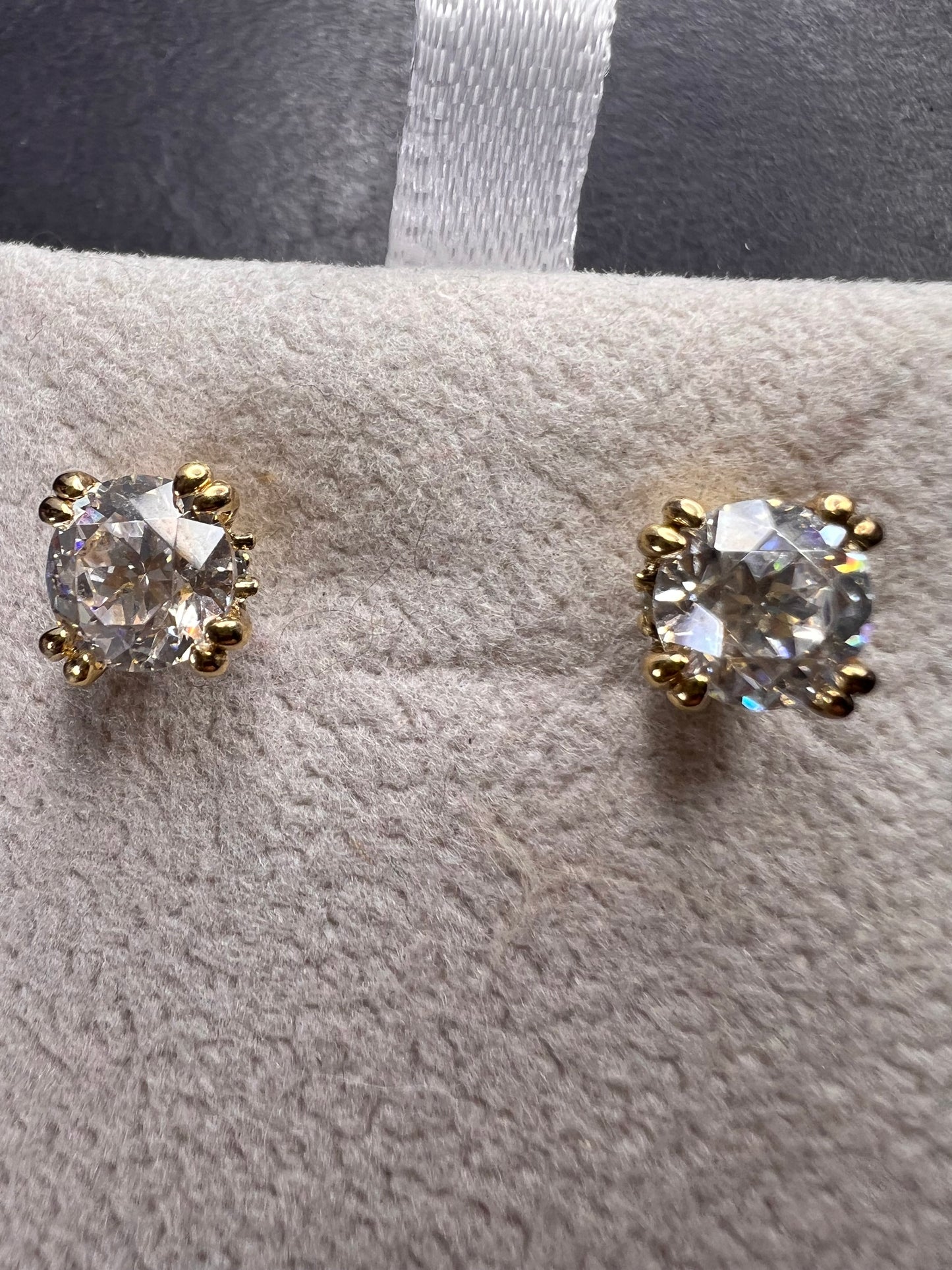 CZ stud earrings in gold over sterling silver