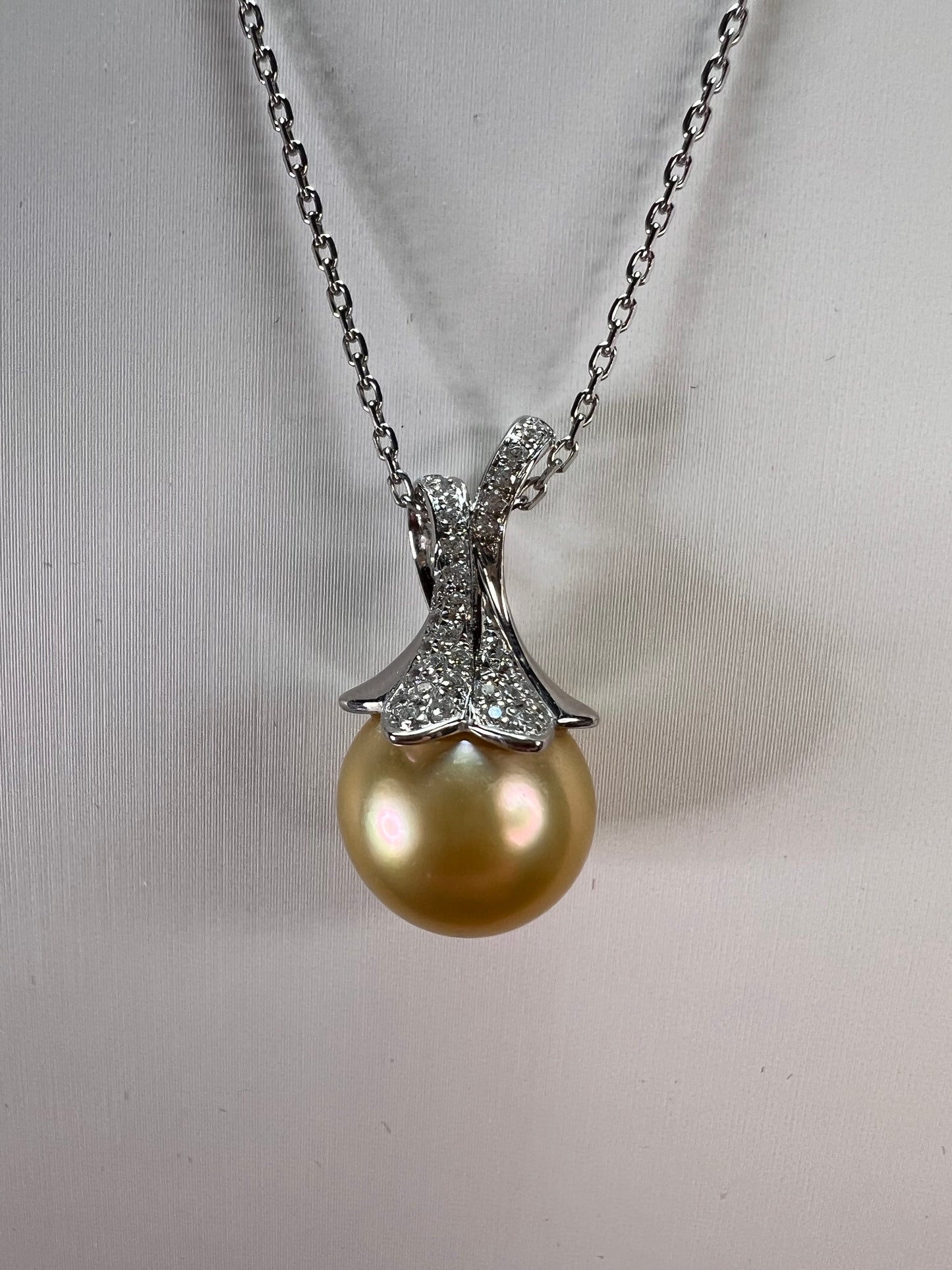 Golden south seas pearl pendant in rhodium over sterling silver with chain