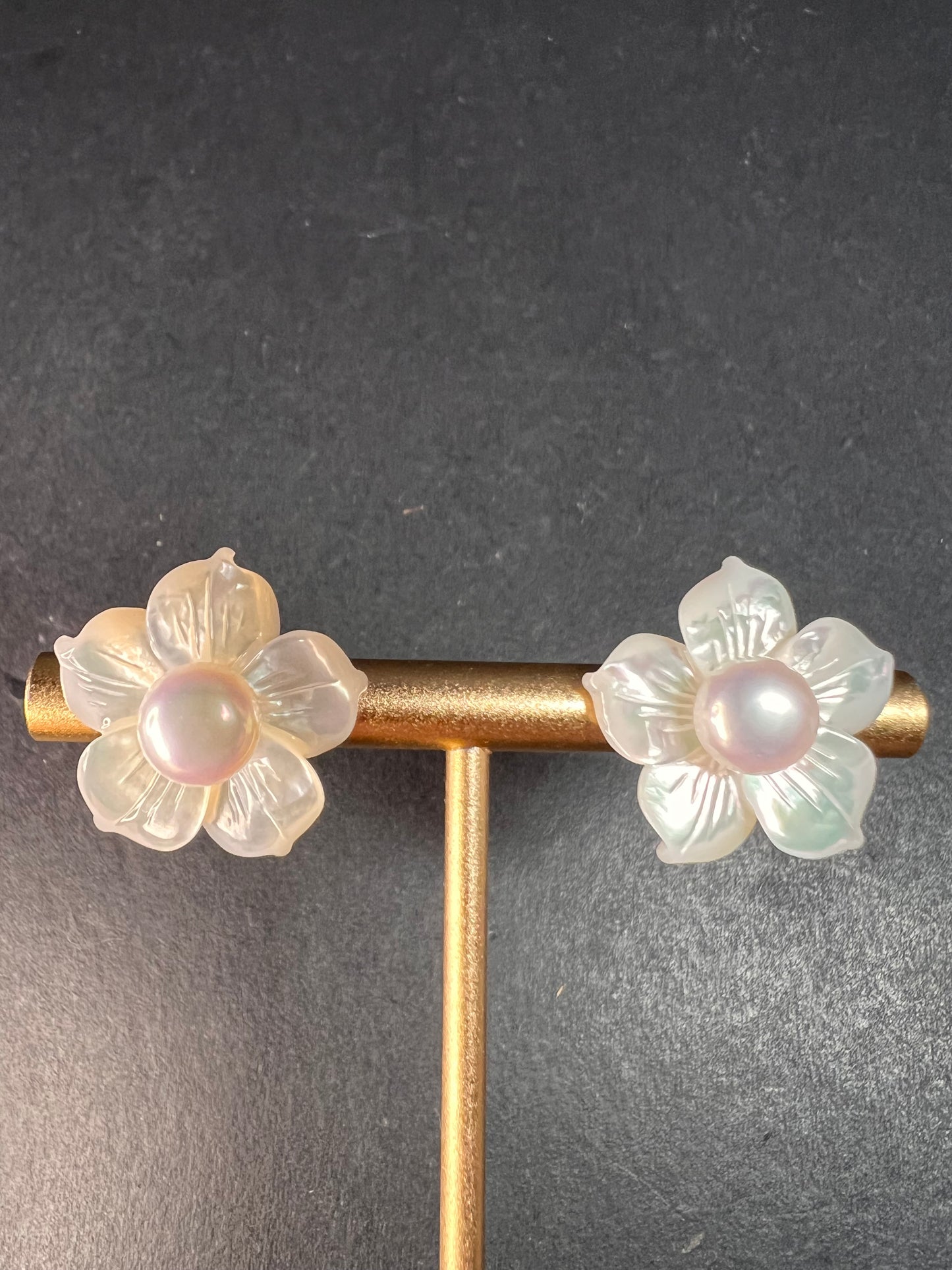 Vintage dead stock set of mother of pearl plumeria stud earrings in sterling silver