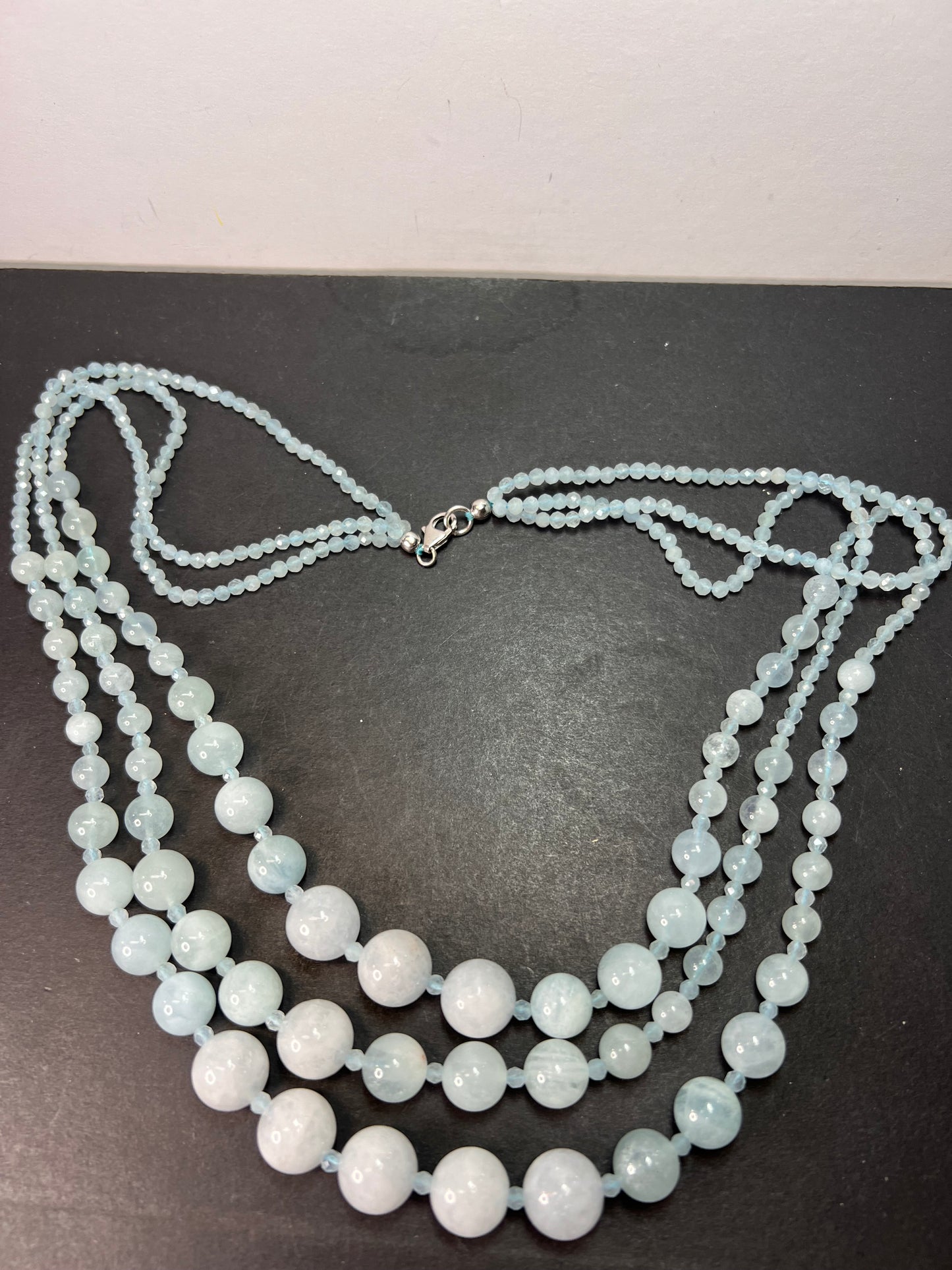 Triple strand aquamarine necklace with sterling silver lobster clasp