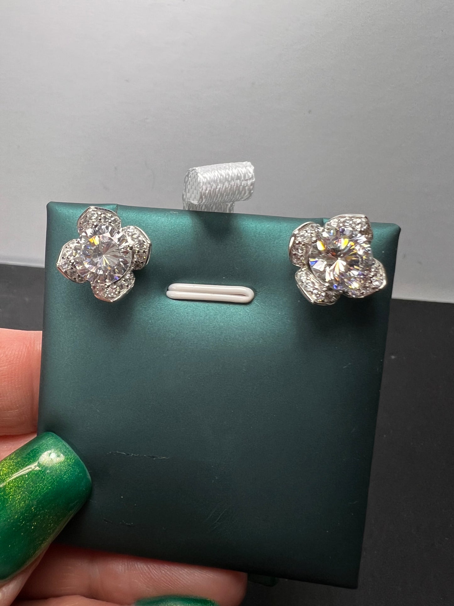 CZ floral styled stud earrings in rhodium over sterling silver