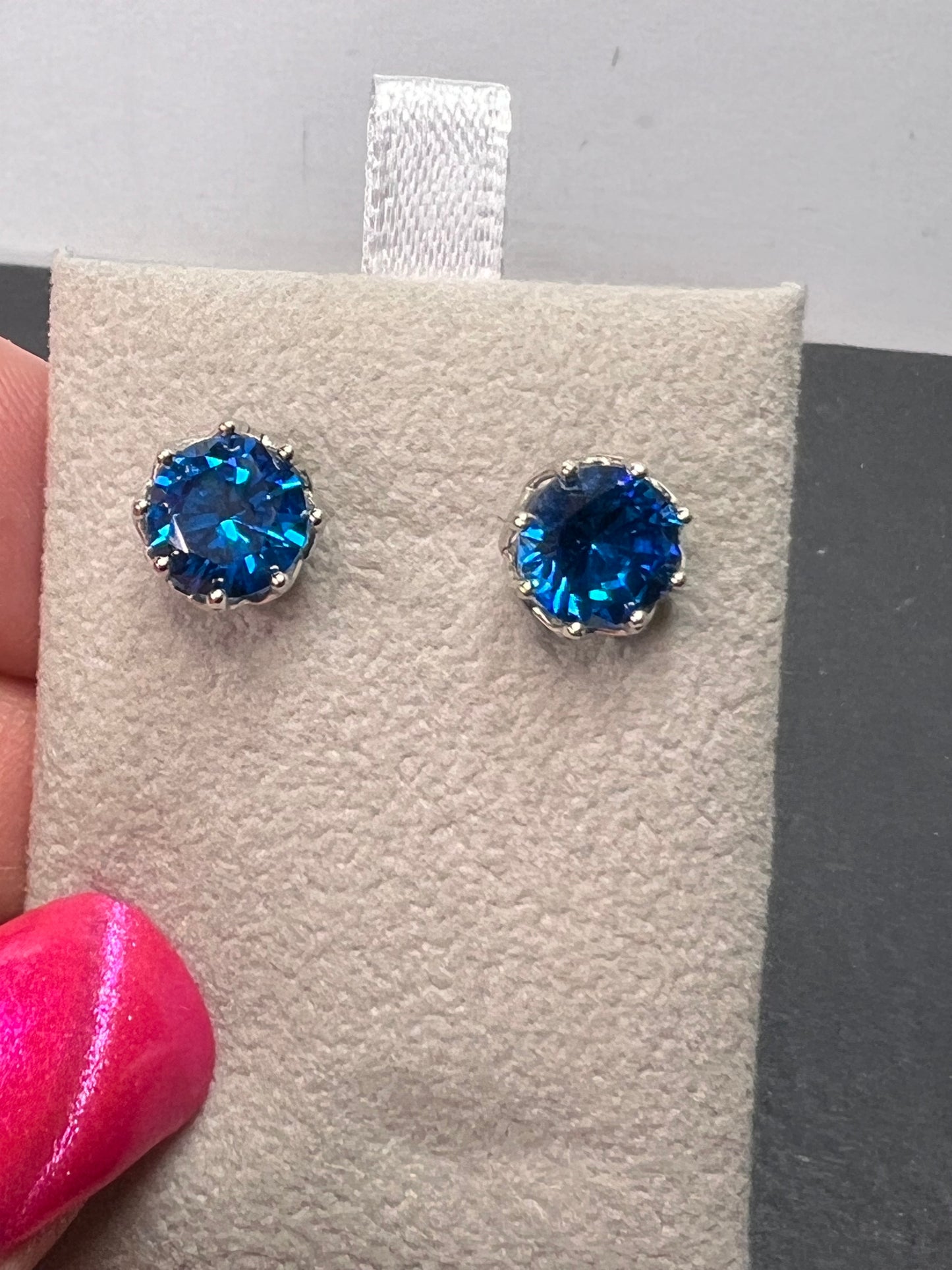 YGI blue CZ rhodium over sterling silver solitaire stud earrings