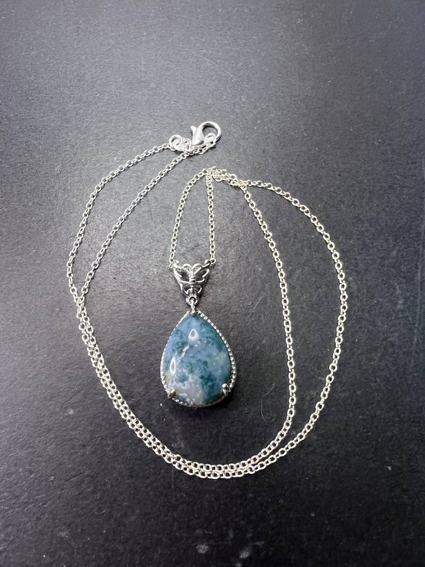 Moss agate teardrop pendant with butterfly in platinum over copper with 18 inch chain