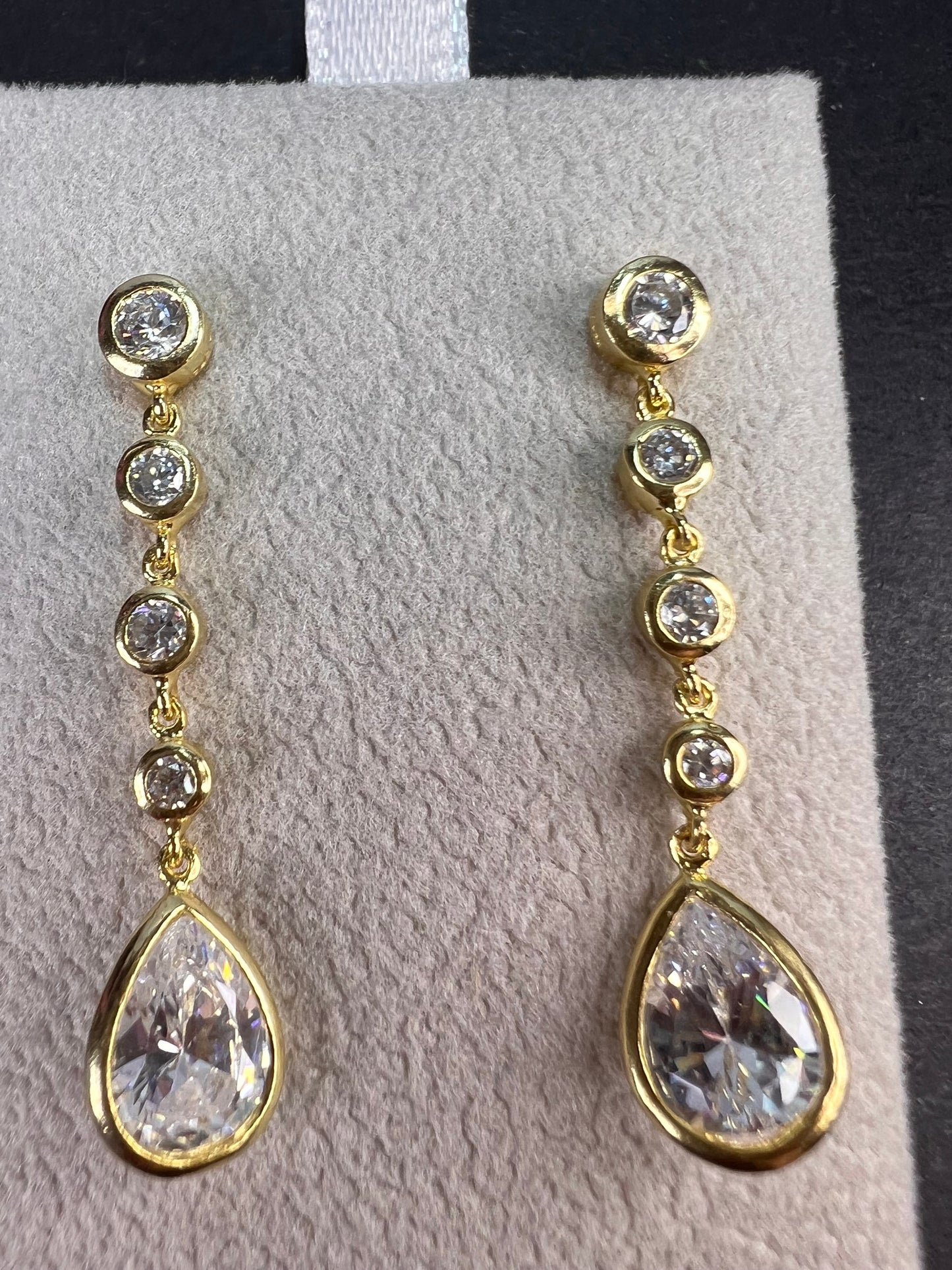 Long teardrop CZ earrings in gold over sterling silver