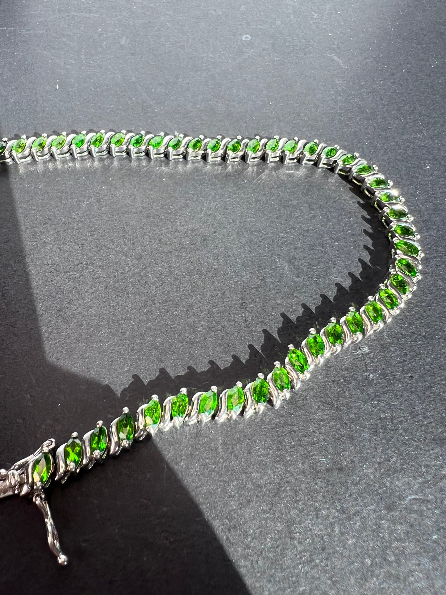 Chrome diopside tennis bracelet in rhodium over sterling silver