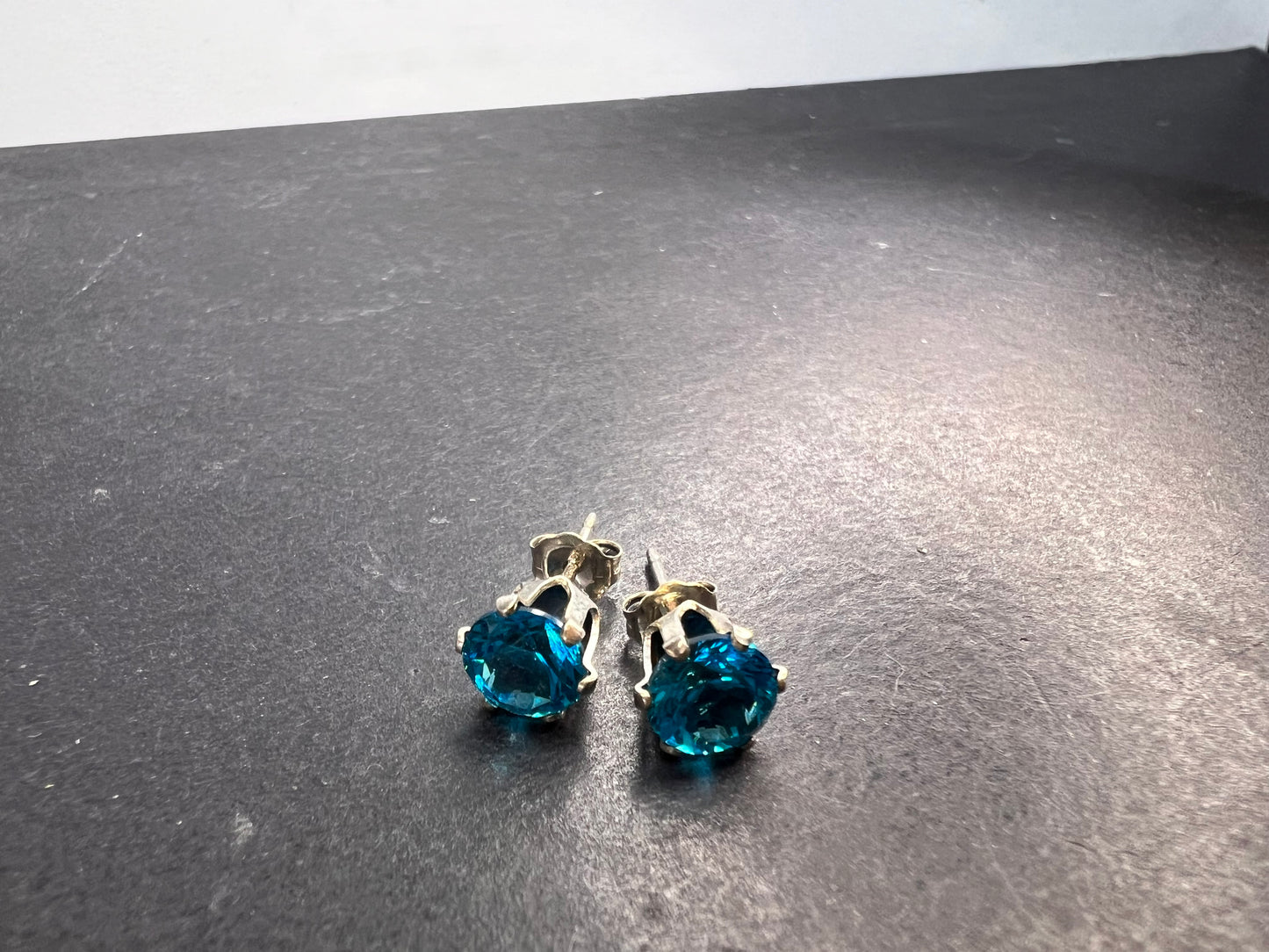 Blue stone stud earrings in sterling silver