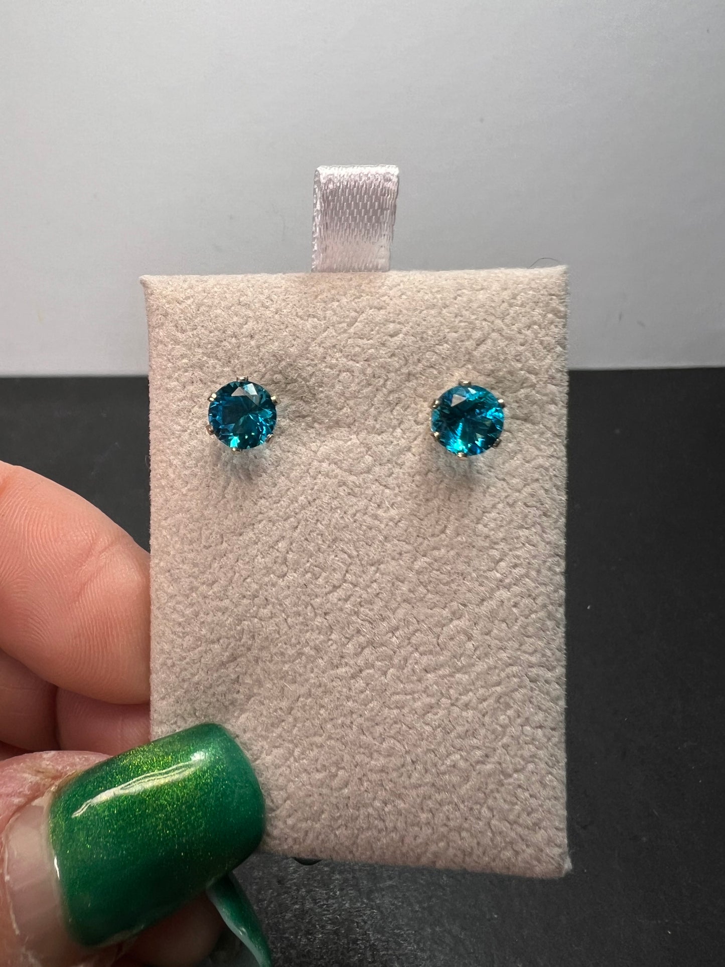 Blue stone stud earrings in sterling silver