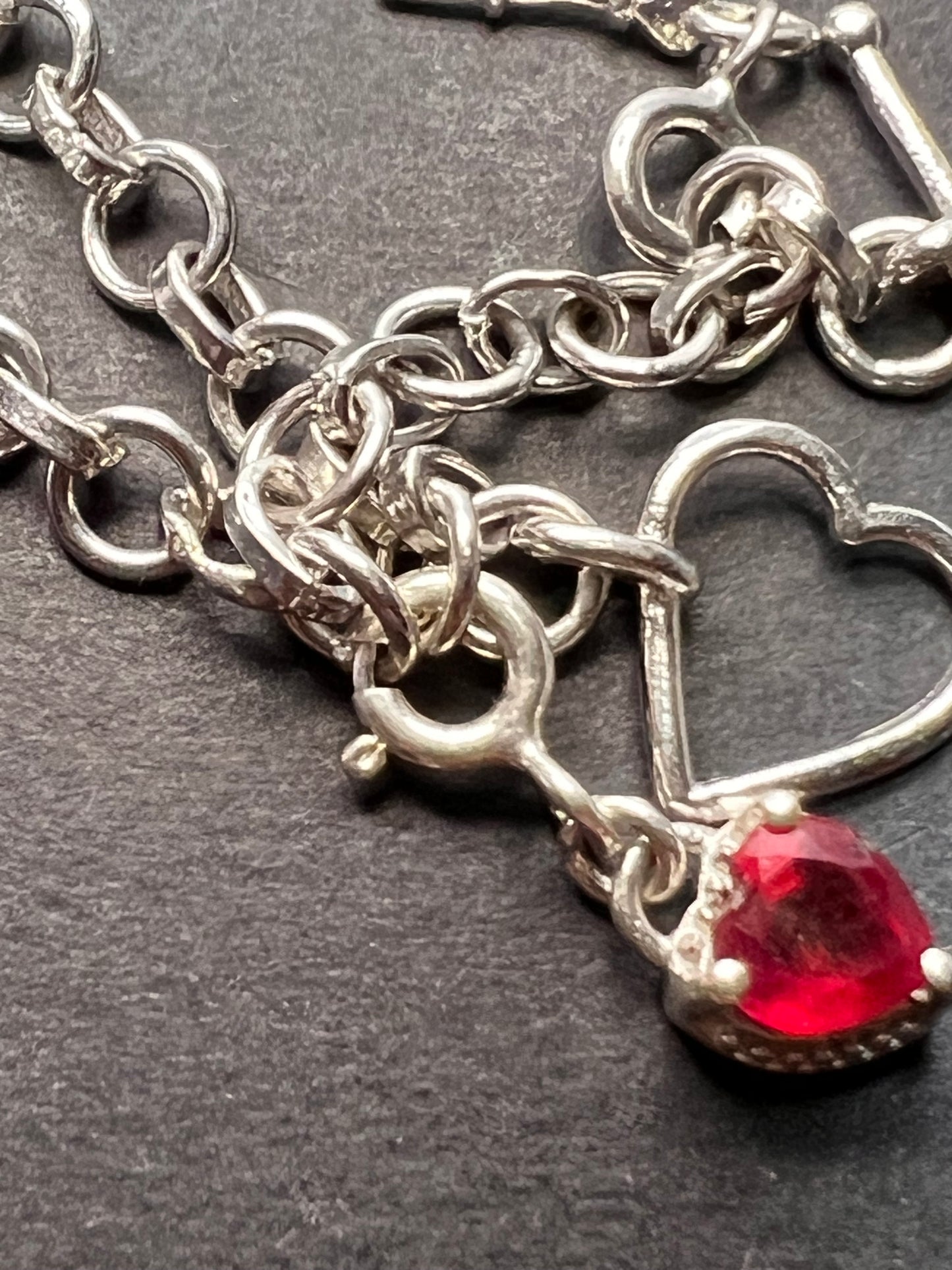 Sleeping Beauty turquoise sterling silver key and heart charm bracelet with toggle clasp and ruby