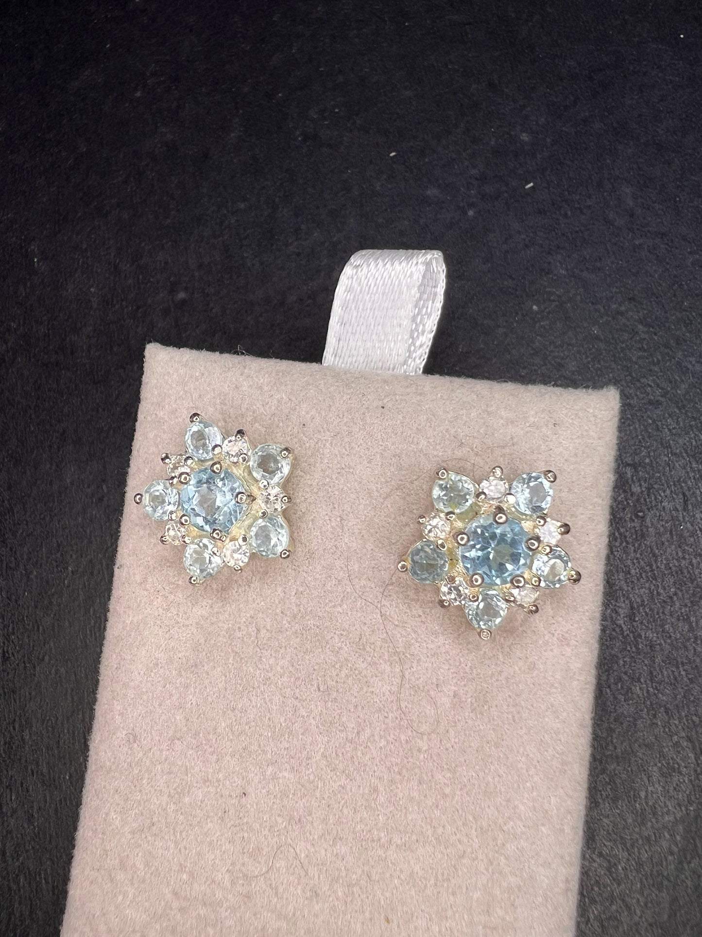 Vintage blue topaz and cz sterling silver snowflake stud earrings