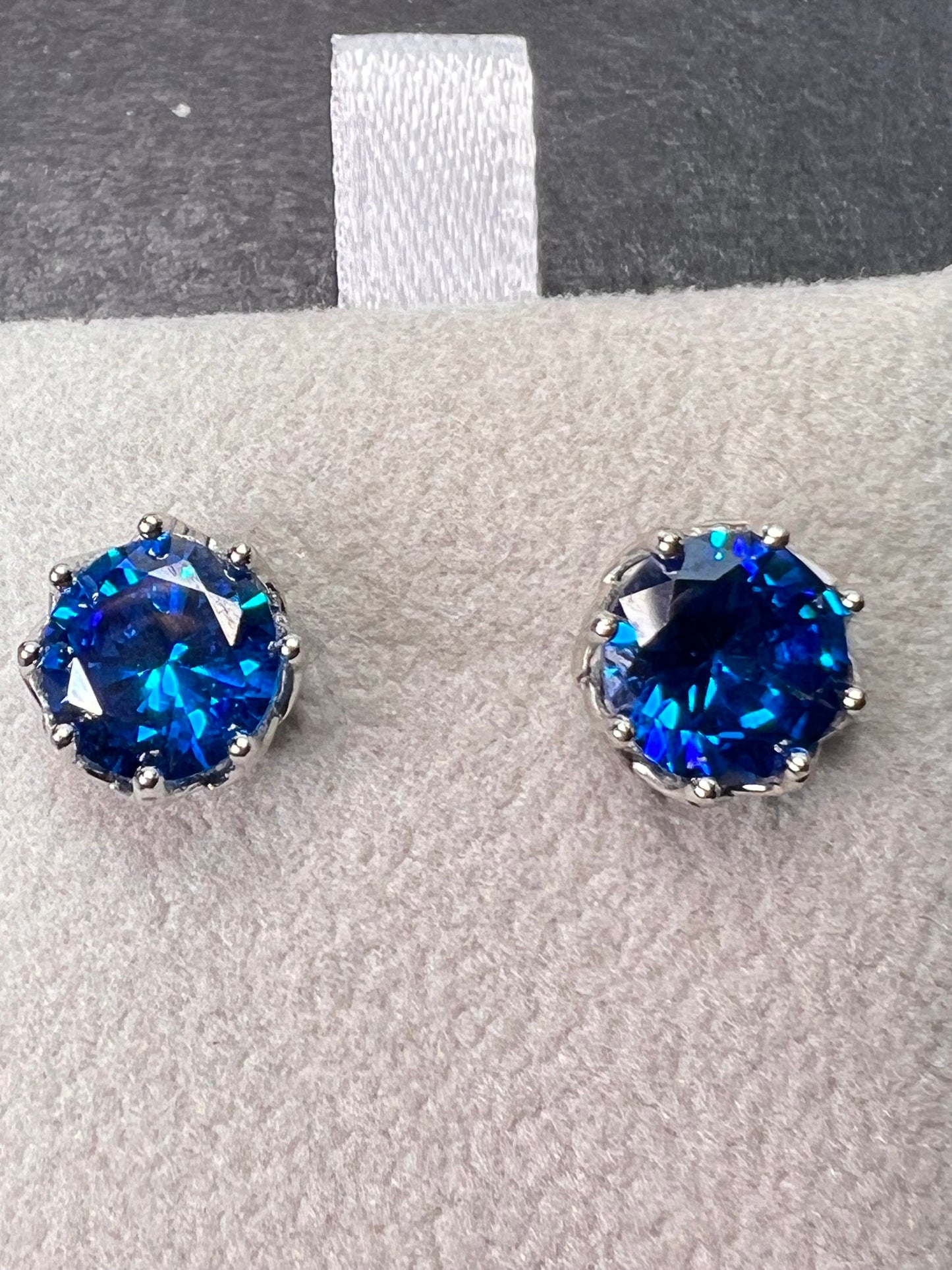 YGI blue CZ rhodium over sterling silver solitaire stud earrings