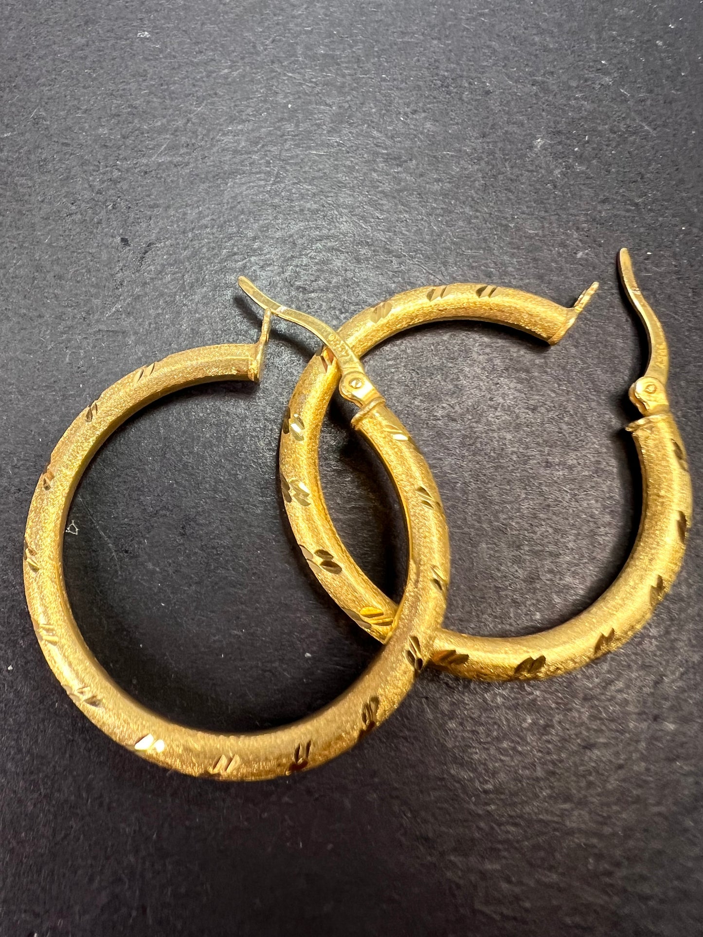 Satin finish diamond cut hoop earrings in yellow gold over sterling silver