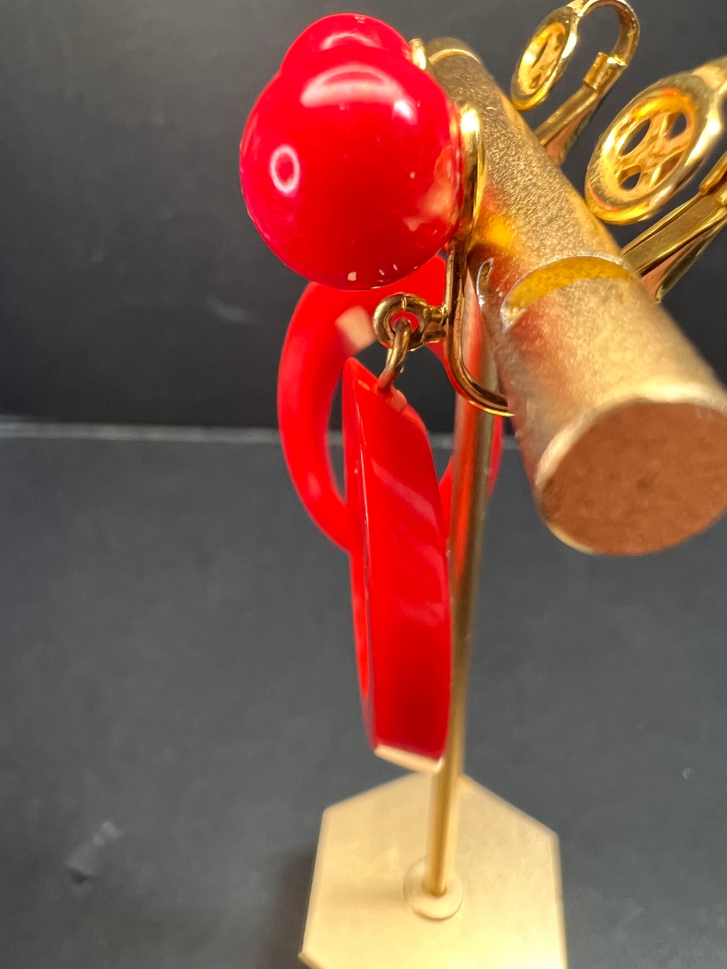 Vintage Trifari red lucite hoop clip on earrings