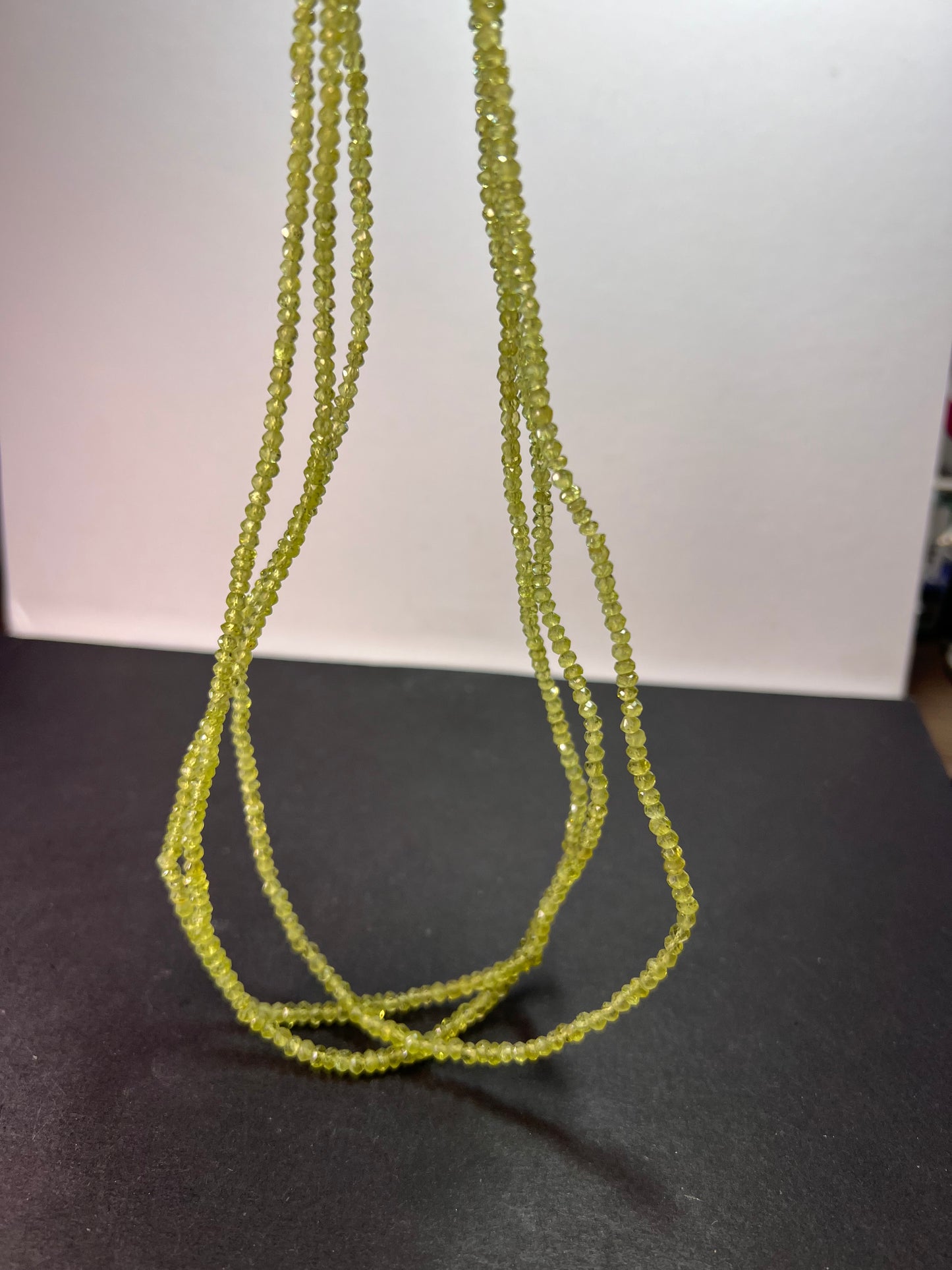 Layered peridot necklace with sterling silver clasp