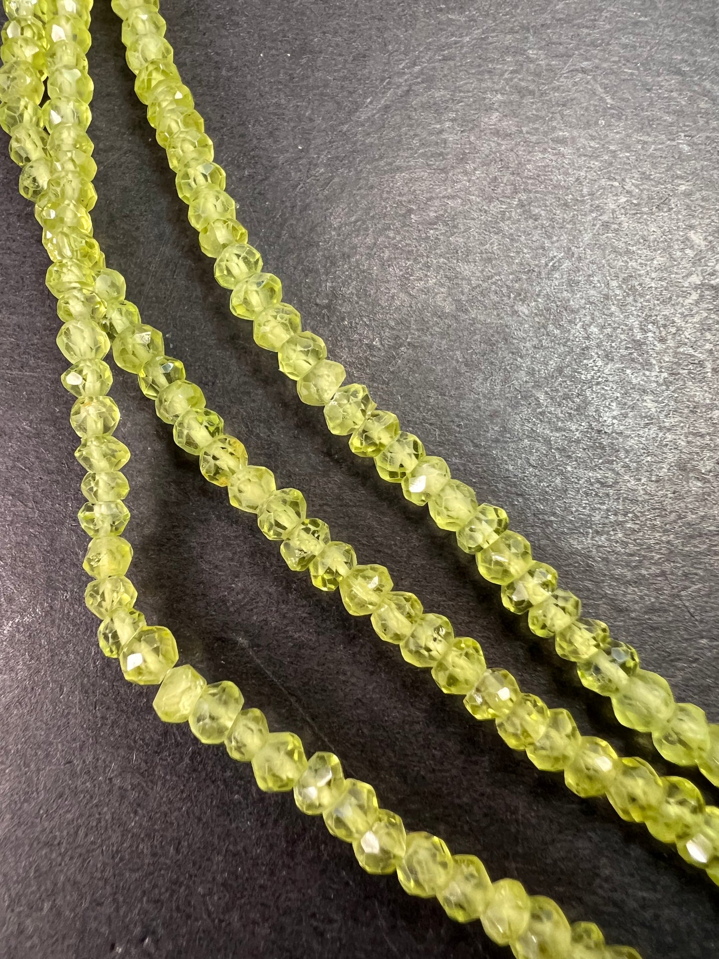 Layered peridot necklace with sterling silver clasp