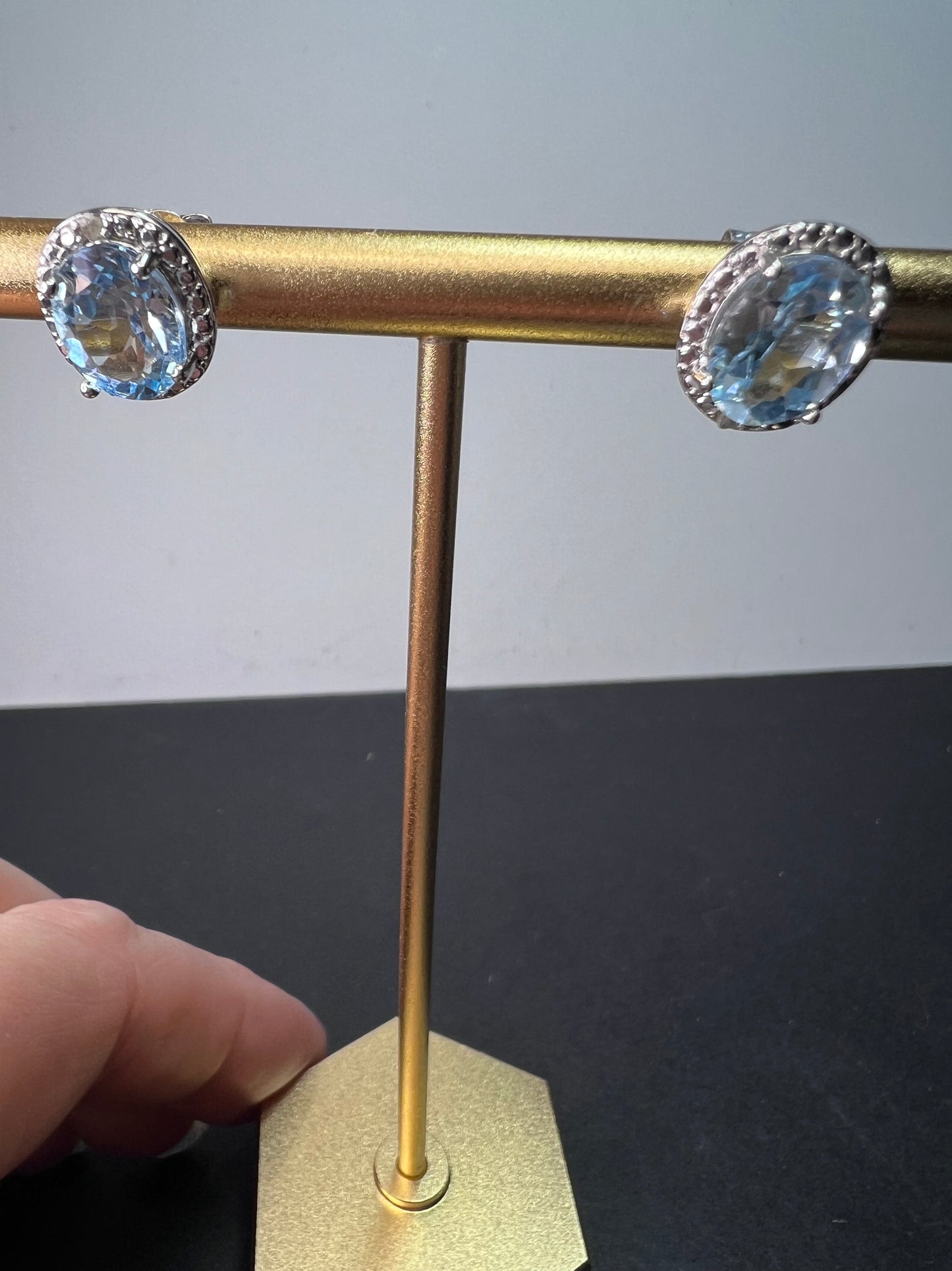 Blue topaz halo stud earrings