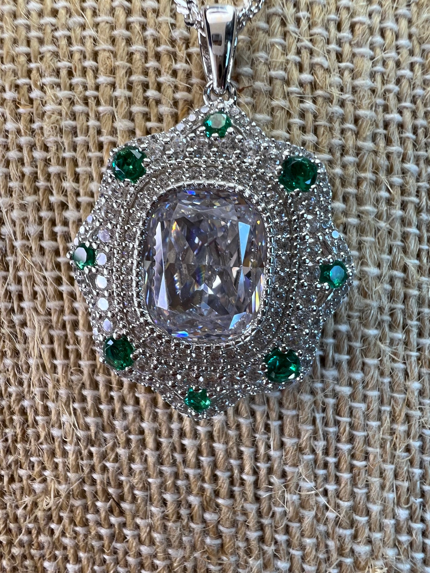 Bella Luce lab created green spinel and diamond simulant rhodium over sterling silver pendant with 18 inch chain necklace