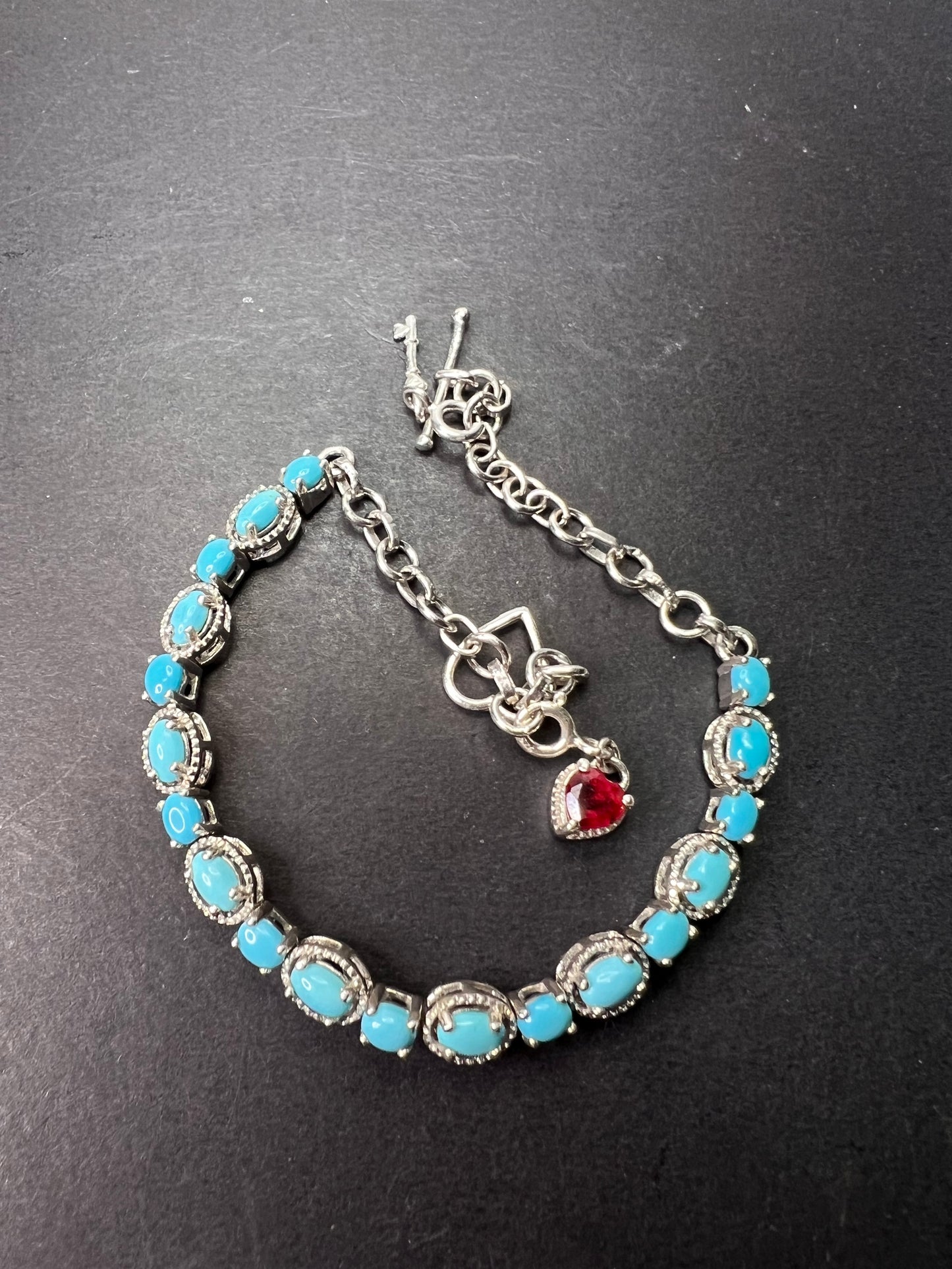 Sleeping Beauty turquoise sterling silver key and heart charm bracelet with toggle clasp and ruby